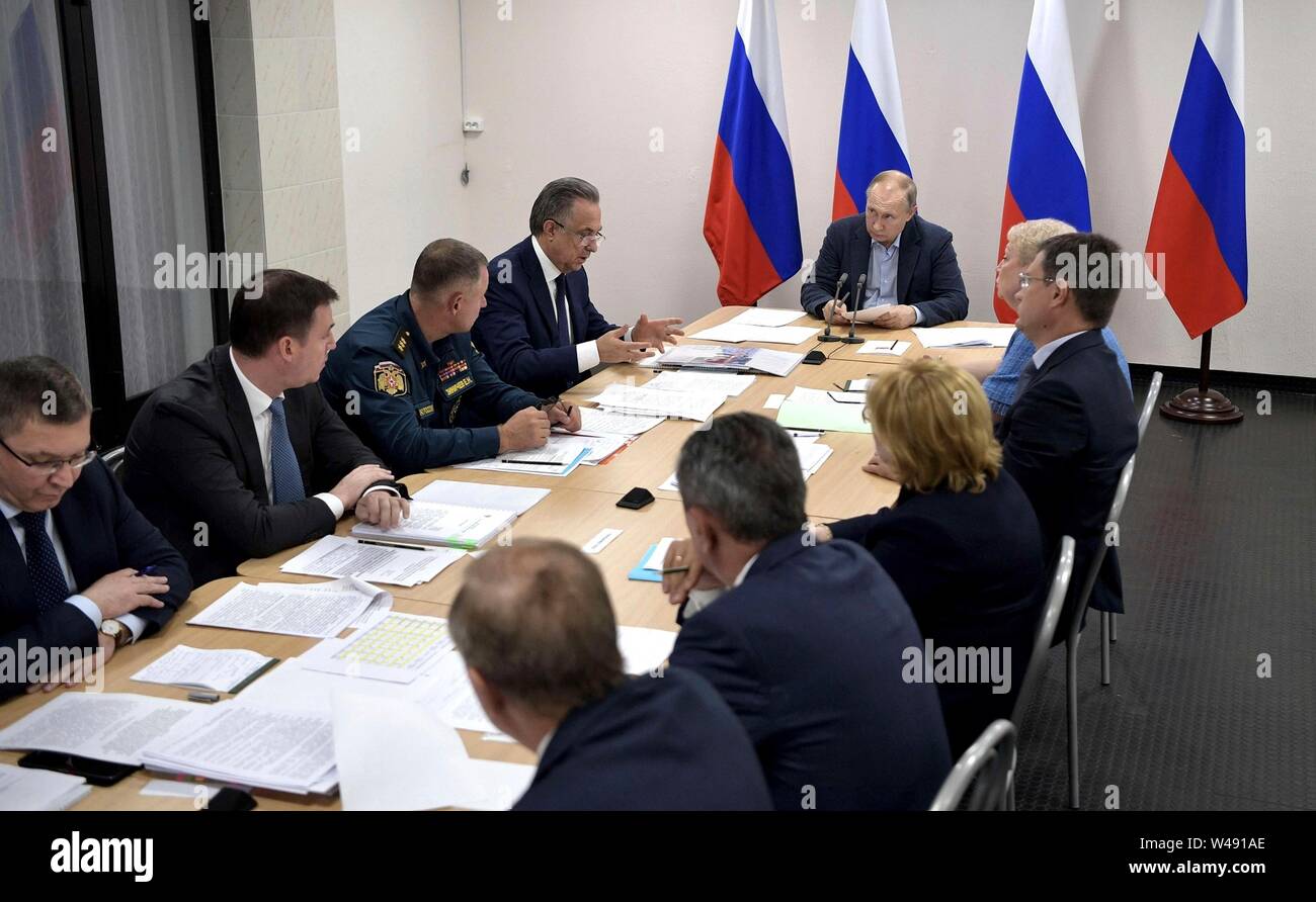 Russian President Vladimir Putin meets with local and regional officials to discuss flood relief efforts in the Irkutsk Region July 19, 2019 in Bratsk, Irkutsk, Russia. The flooding in eastern Siberia is the worst in the recorded history of the region effecting 3,800 homes. Stock Photo