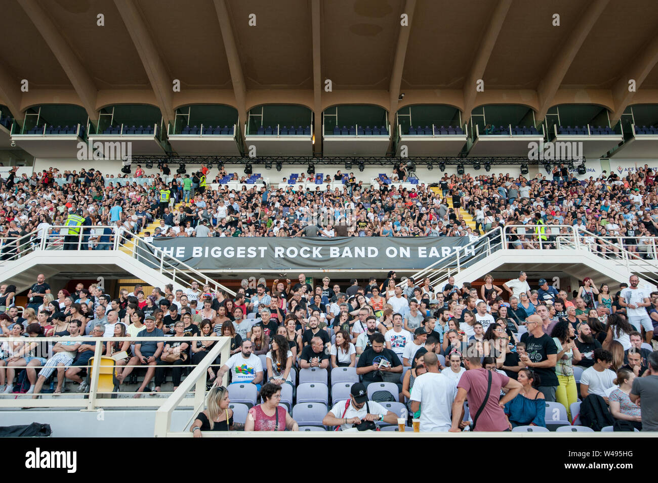 Florence, Italy - 2018, July 21: audience in the stadium bleachers during  the “Rockin’1000 - That’s Live”. Stock Photo