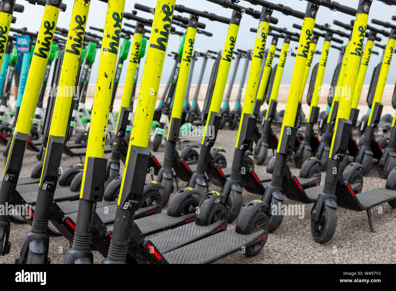 E-scooters in Lisbon, Electric scooters for rent self-service invade the  streets and sidewalks with more than 90 hotspots in Lisbon, Portugal Stock  Photo - Alamy