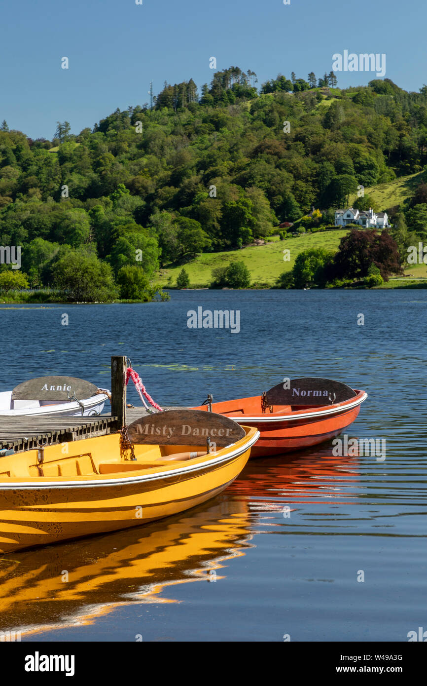pleasure boats on Grasmere looking towards Loughrigg Terrace Stock Photo
