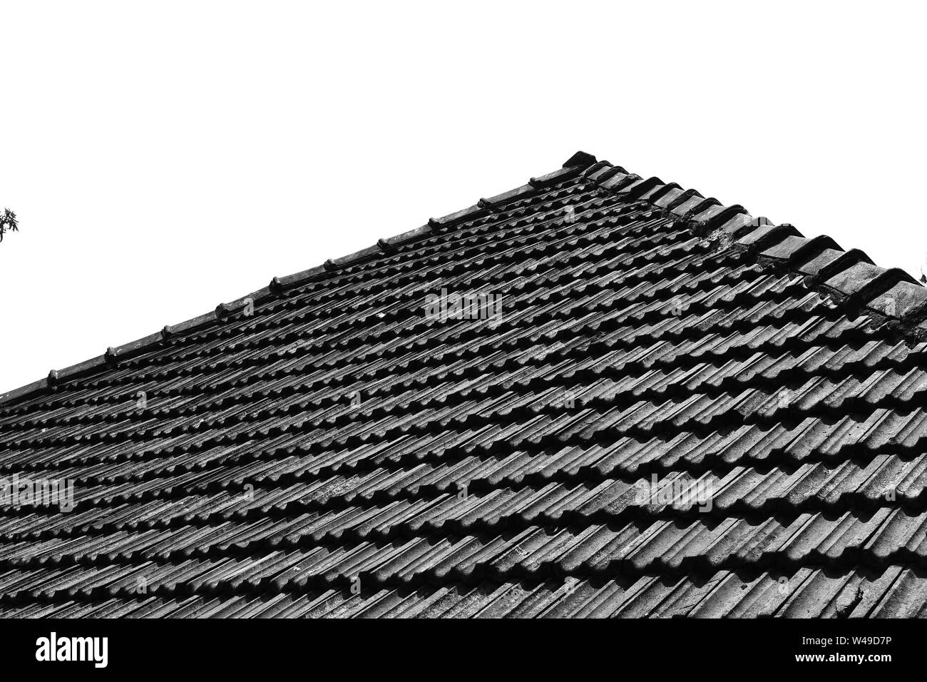 Slanting roof of a house in Goa in black and white. Stock Photo