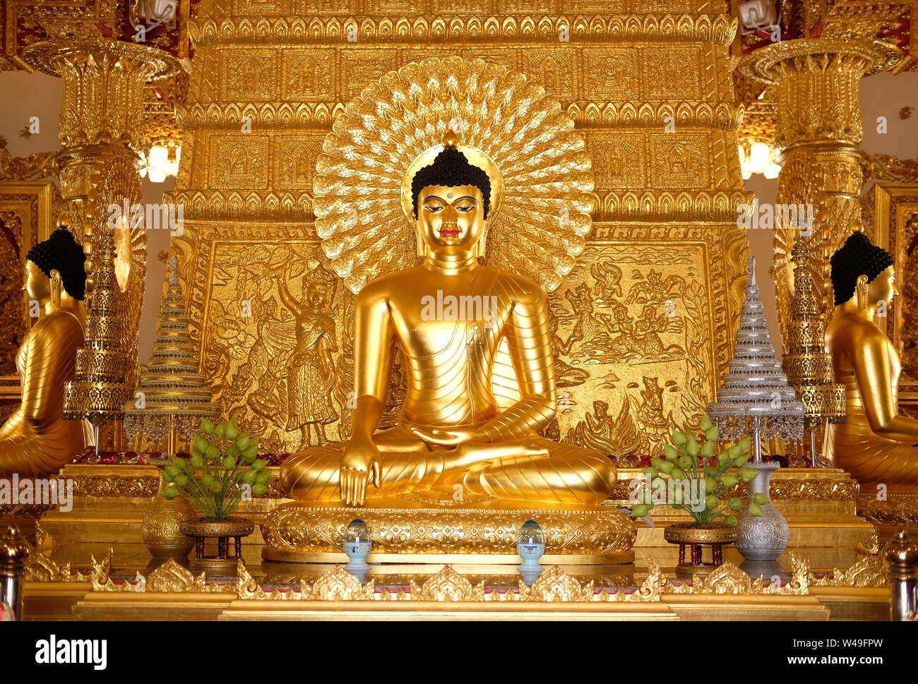 golden buddha image statue in buddhist temple Stock Photo - Alamy