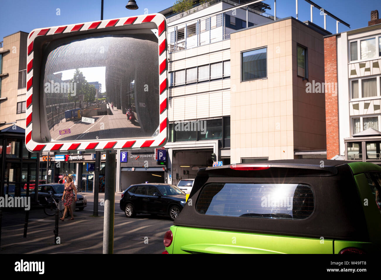 road traffic safety mirror on the Neven-Du Mont street, Cologne, Germany.  Verkehrsspiegel an der Neven-Du Mont-Strasse, Koeln, Deutschland. Stock Photo