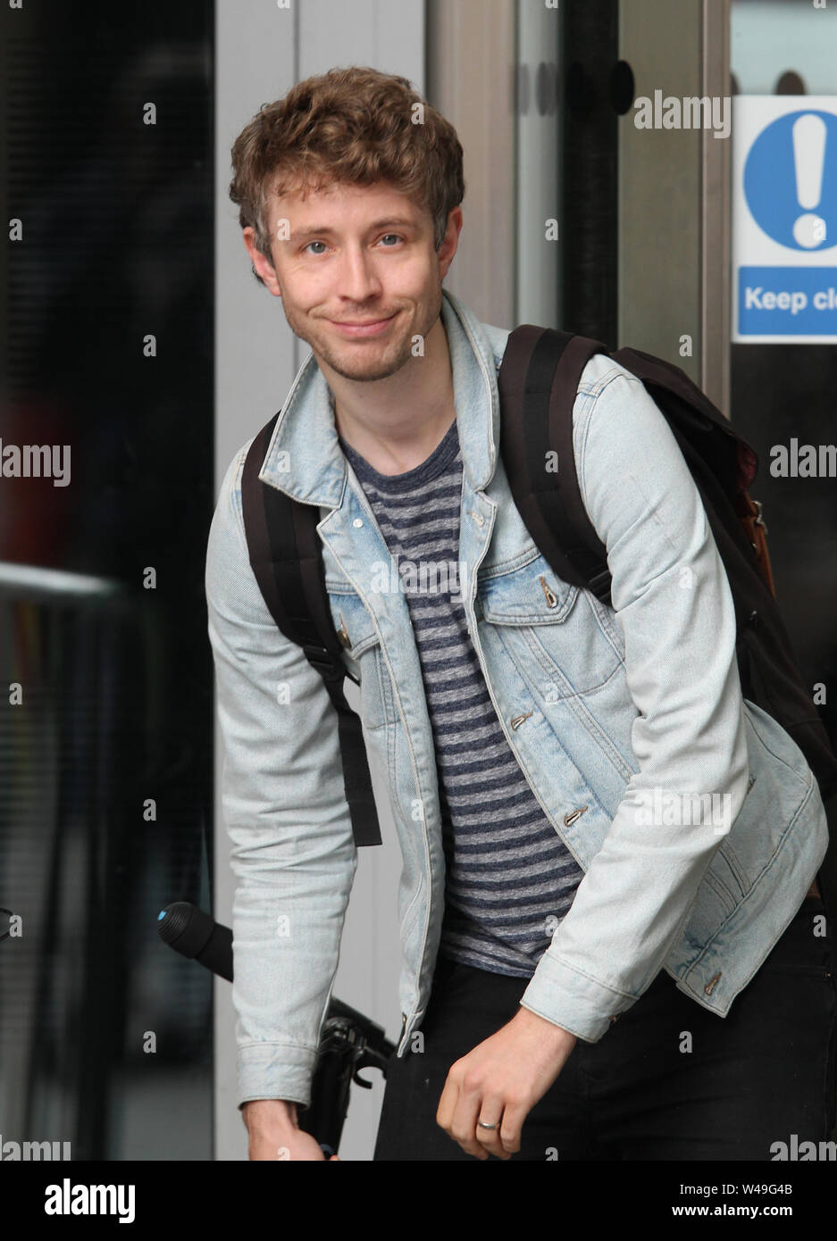 London, UK, 21th July 2019. Matt Edmondson seen with his scooter at the BBC Broadcasting House studios Credit: WFPA/Alamy Live News Stock Photo