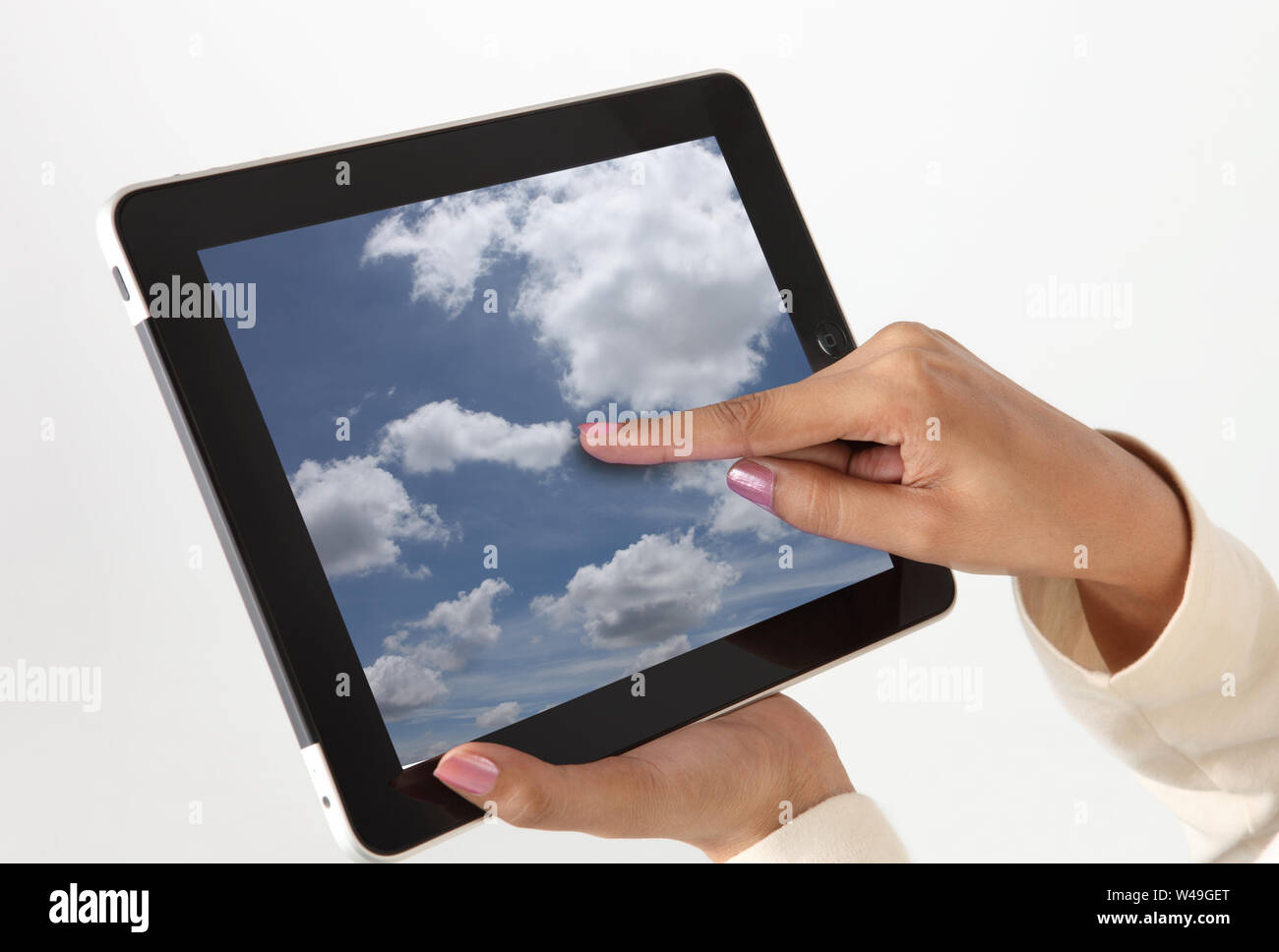 Close up of a person hand using a digital tablet Stock Photo