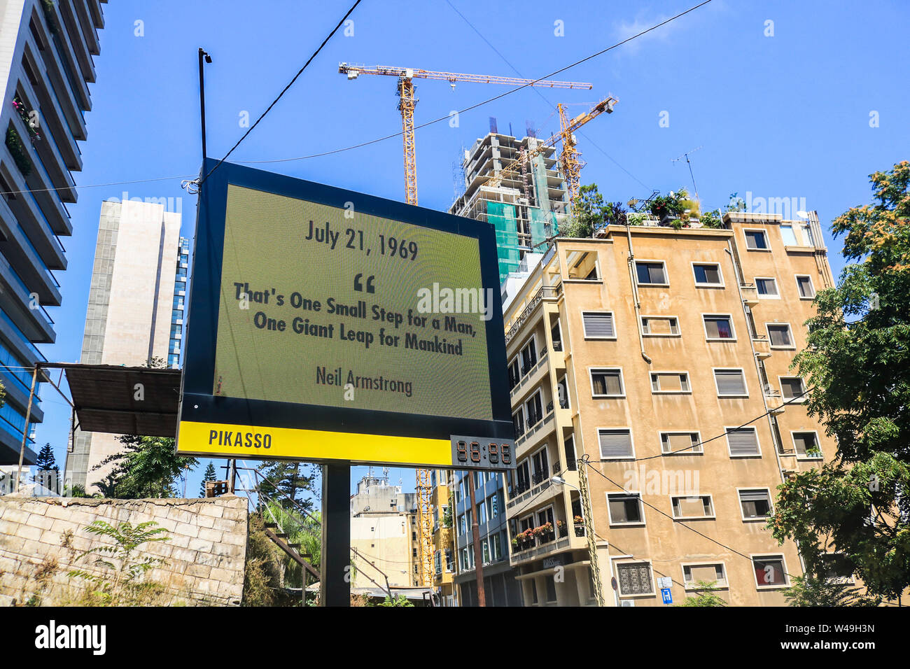 Beirut, Lebanon. 21st July 2019. A giant billboard in Beirut celebrates the 50th anniversary of the Apollo 11 landing on the moon surface on 21 July 1969 with the famous quote by American astronaunt Neil Armstrong  Credit: amer ghazzal/Alamy Live News Stock Photo