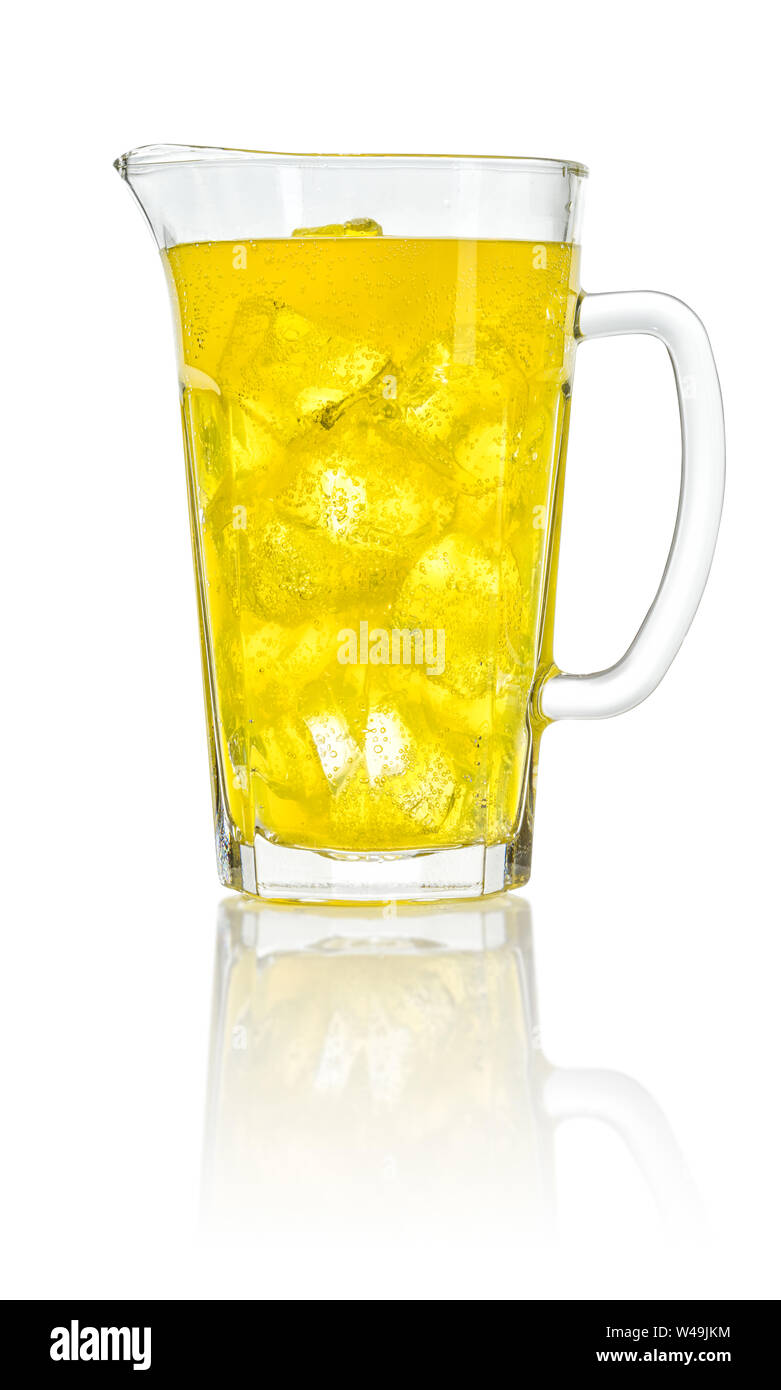 An orange soft drink with ice cubes in a pitcher Stock Photo