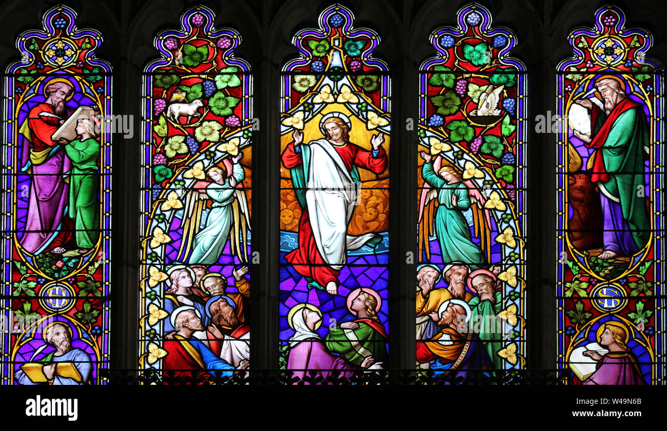 'Ascension with the Four Evangelists' Stained Glass Window Stock Photo