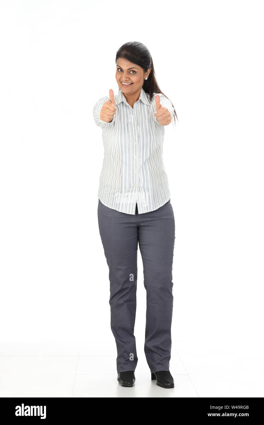 Mature woman double thumbs up hi-res stock photography and images - Alamy