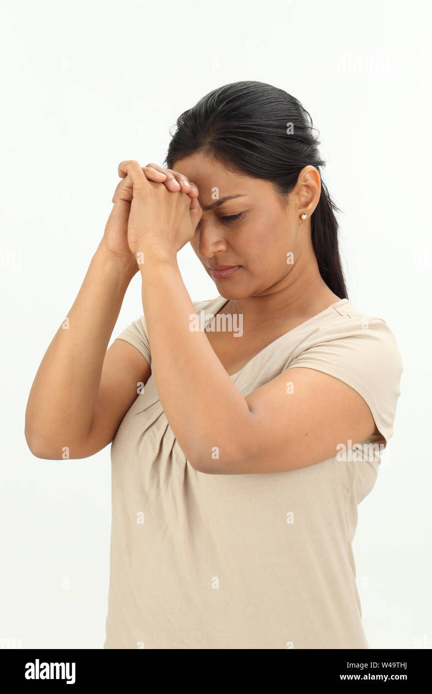 Woman hands on head black top hi-res stock photography and images - Alamy