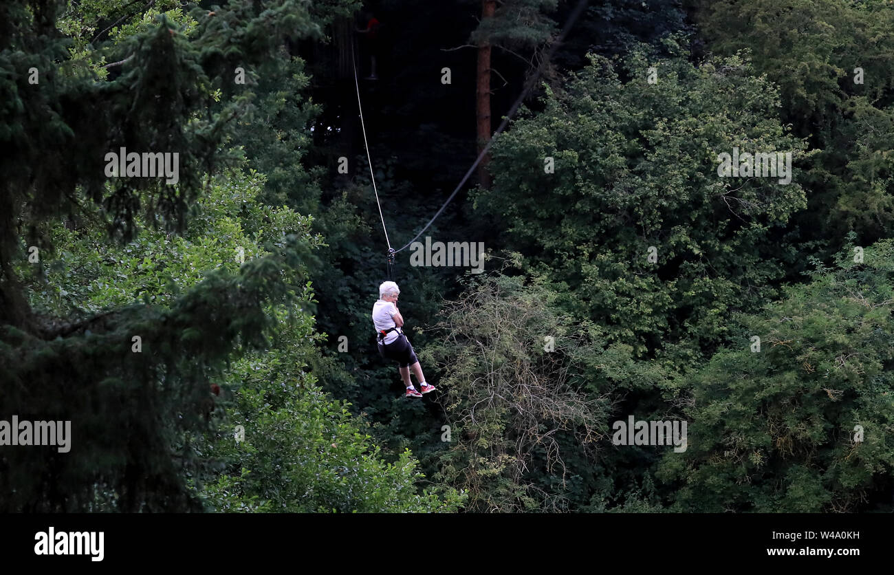 Eileen Noble 84 Heads Down A 250 Metres Zip Wire As She Becomes The Oldest Person To Complete The Go Ape Treetop Challenge At Leeds Castle Maidstone In Kent Stock Photo Alamy