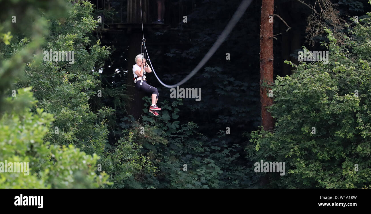 Eileen Noble 84 Heads Down A 250 Metres Zip Wire As She Becomes The Oldest Person To Complete The Go Ape Treetop Challenge At Leeds Castle Maidstone In Kent Stock Photo Alamy