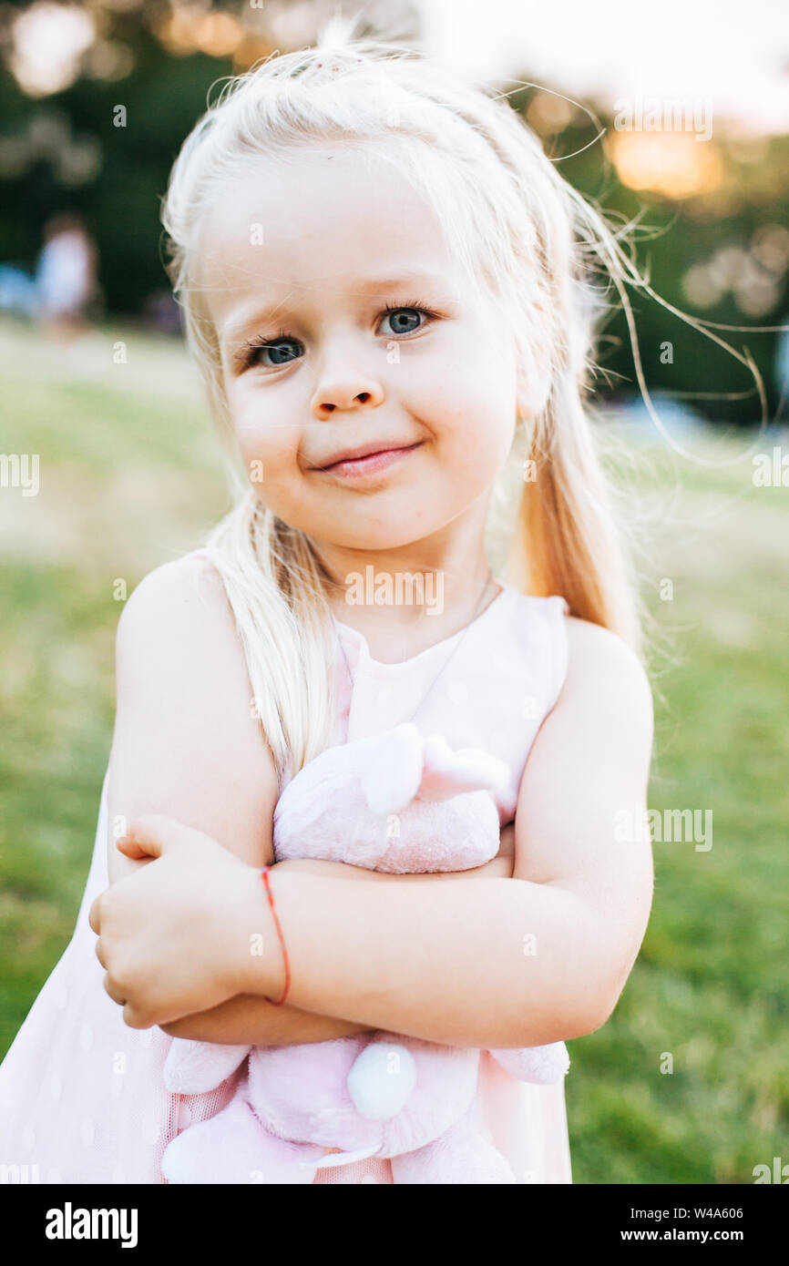 Blond little girl in summer hi-res stock photography and images - Alamy