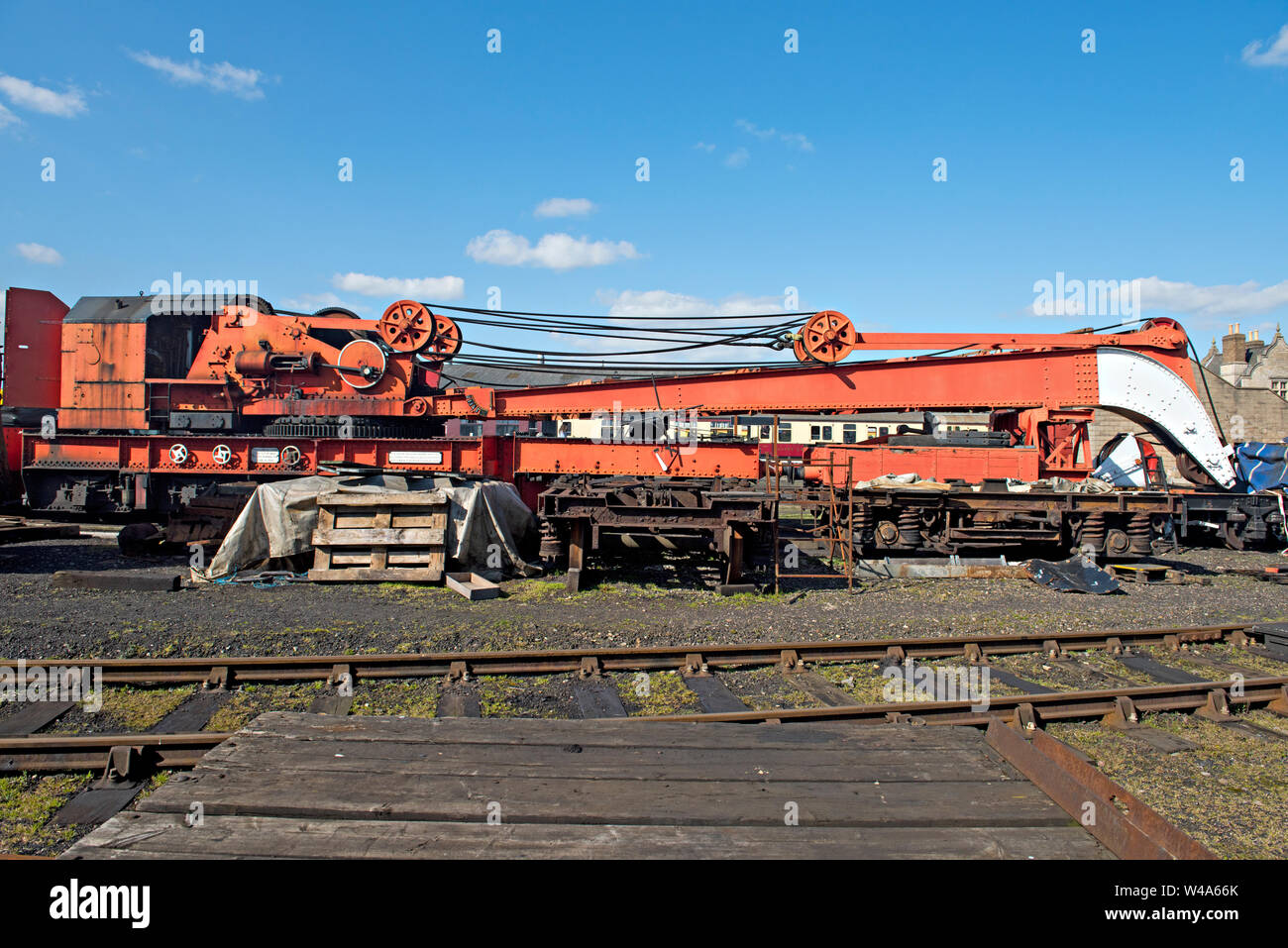 A vintage steam crane in the yard at Wansford on the Nene Valley Railway, UK Stock Photo
