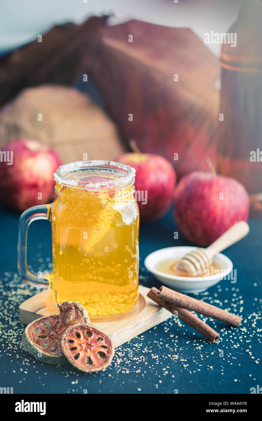 Glass of healthy bael tea with cinnamon, appel and honey Stock Photo