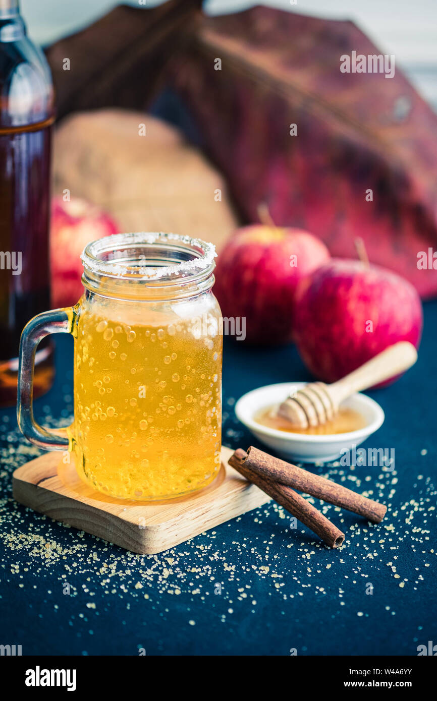 Glass of healthy bael tea with cinnamon, appel and honey Stock Photo