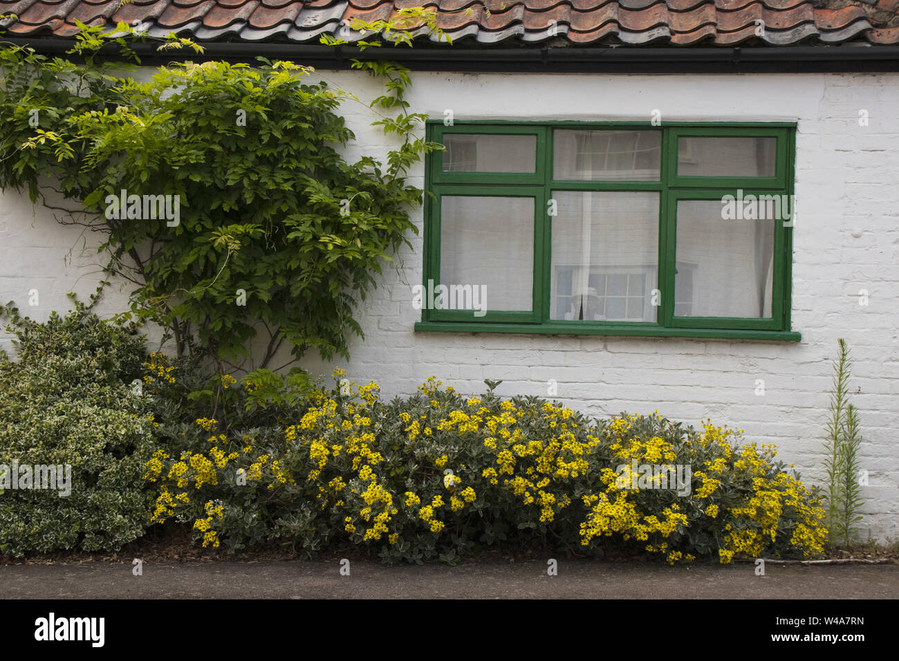 Building in the picturesque village of Wangford, Suffolk, originally a Henham Estate blacksmith's forge Stock Photo