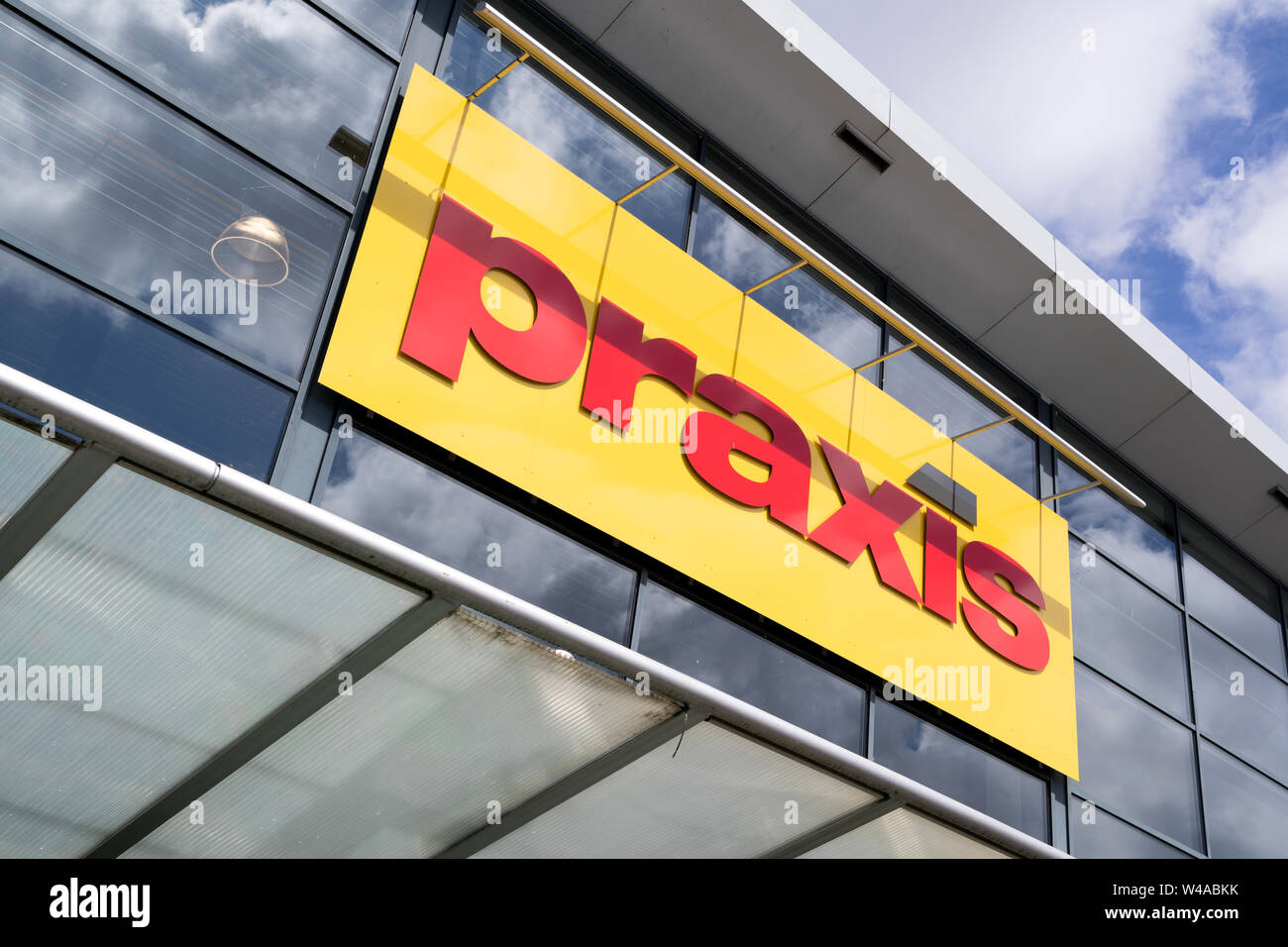 Praxis sign at branch. Praxis is a leading DIY brand in the Netherlands and has about 150 stores. Praxis is part of the Maxeda DIY Group. Stock Photo