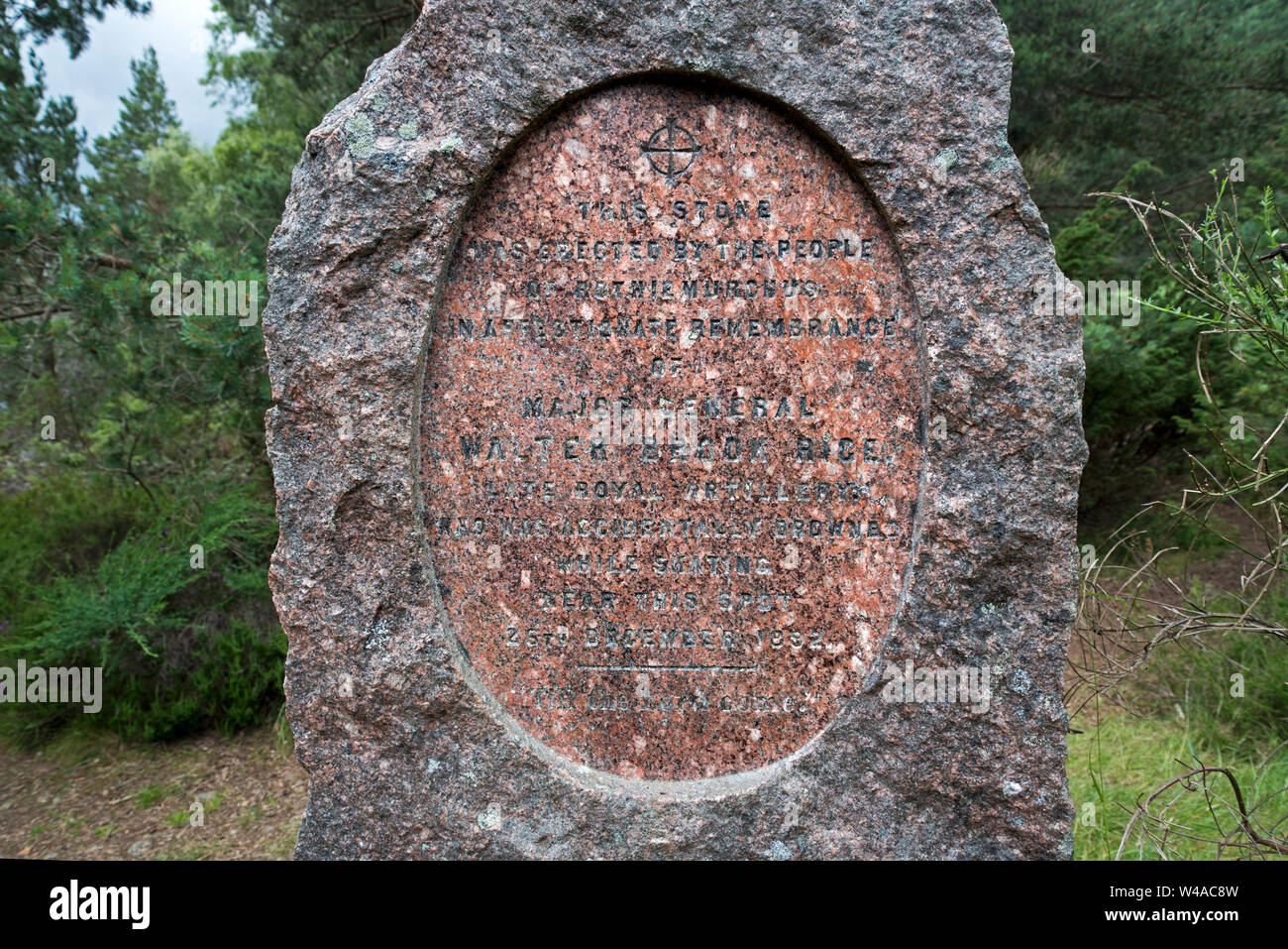 Memorial stone near the spot where Major General Walter Brook Rice accidentally drowned whilst skating on Loch an Eilein on 26th December 1892. Stock Photo