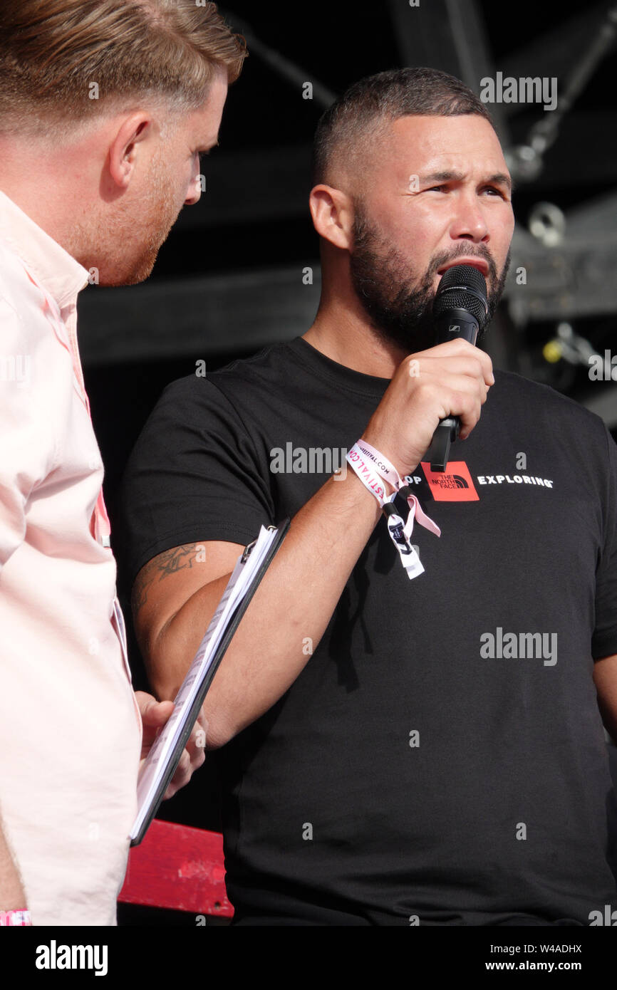 Sefton Park, Liverpool, UK. 21st July 2019. Liverpool boxer Tony Bellew speaks on stage at the 2019 Liverpool International Music Festival (LIMF). Liverpool International Music Festival is in its 7th year at Sefton Park, with more than 70 acts, on 4 stages, spread over 2 days, bringing both international and homegrown talent to the park. Credit:Ken Biggs/Alamy Live News. Stock Photo