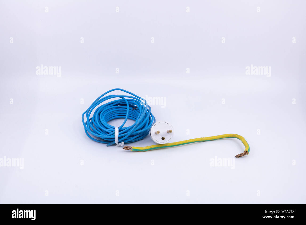 Graphic resource for electrician, electromechanic, isolated objects electric wires and electric plug on white background Stock Photo