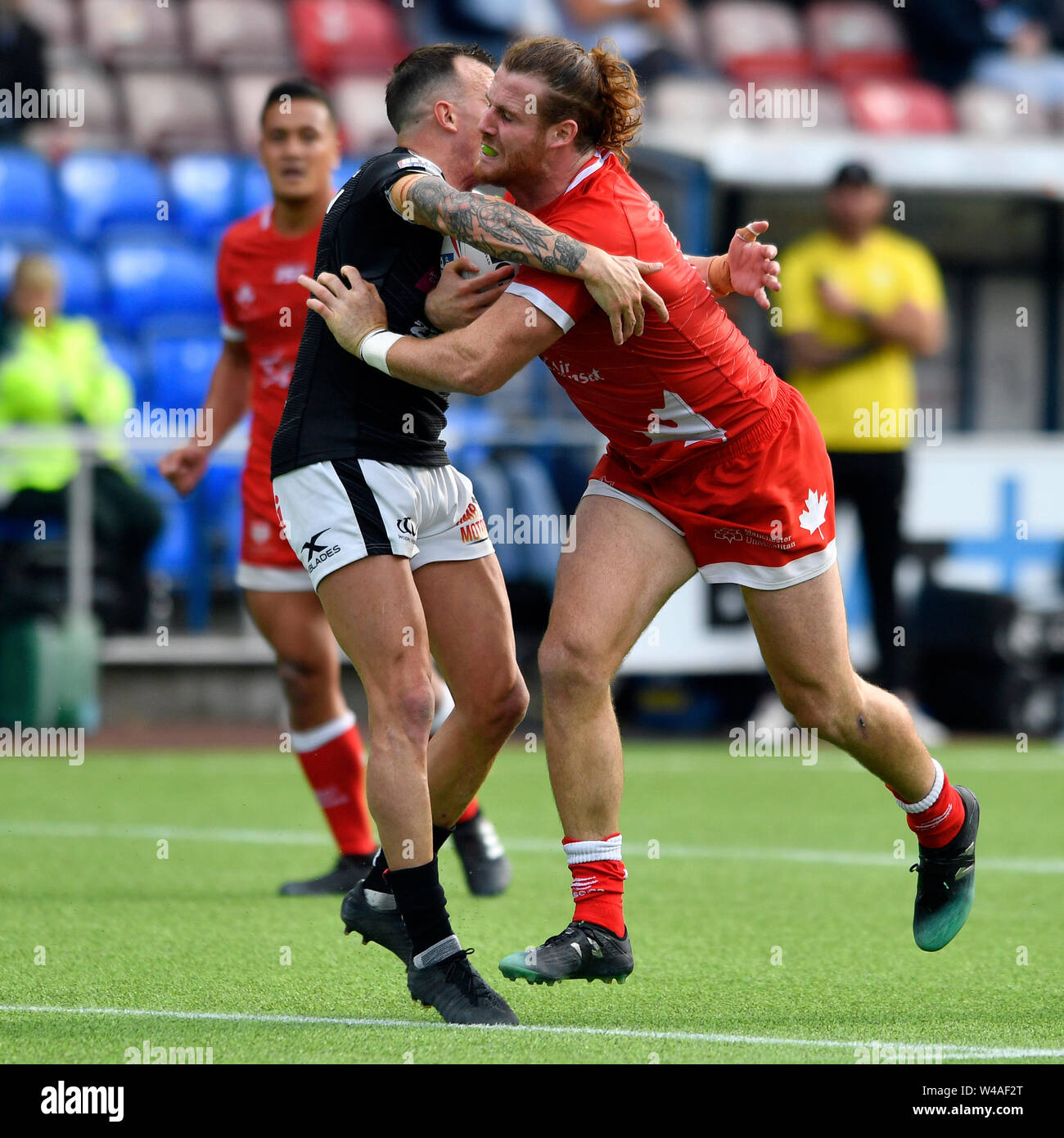 Halton Stadium, Widnes, Cheshire, UK. 21st July, 2019. Betfred Rugby League, Widnes Vikings versus Toronto Wolfpack; Anthony Mullally of Toronto Wolfpack runs into the tackle from Danny Craven of Widnes Vikings Credit: Action Plus Sports/Alamy Live News Stock Photo