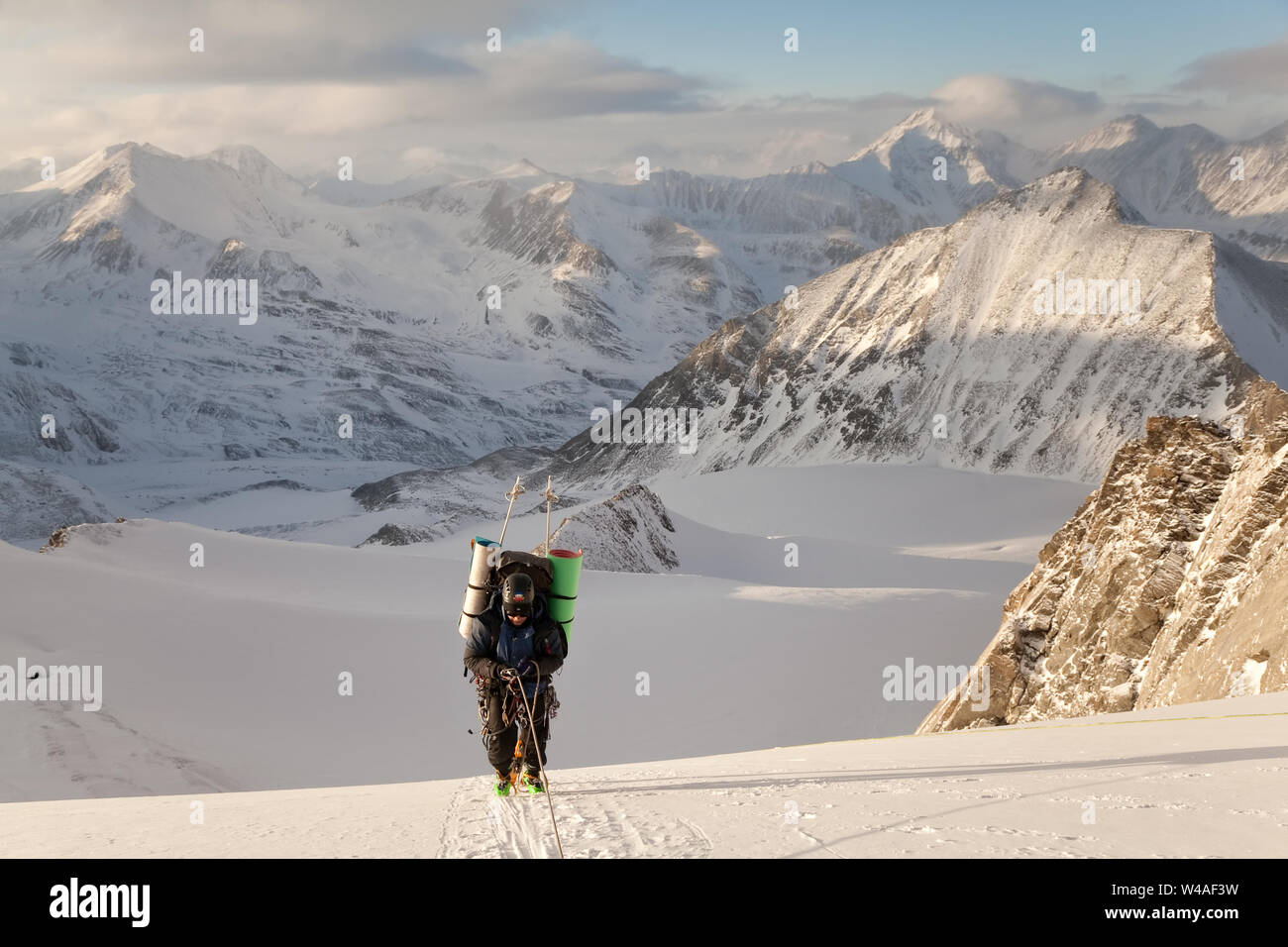 Backpacking ski tour climbers in Altay high mountains. Siberia. Russia ...