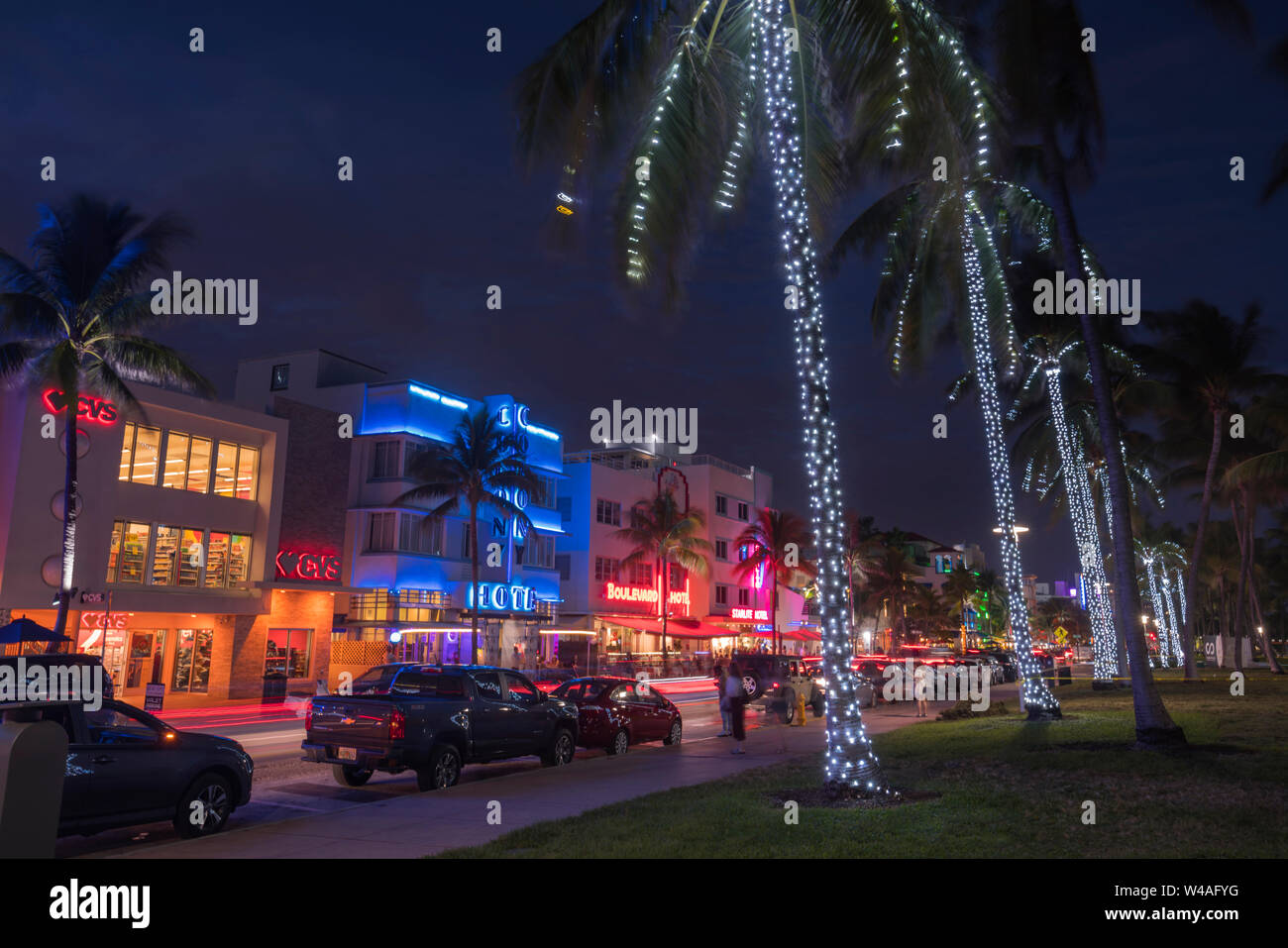 CHRISTMAS LIGHTS ON PALM TREES HOTELS OCEAN DRIVE LUMMUS PARK SOUTH BEACH MIAMI BEACH FLORIDA USA Stock Photo