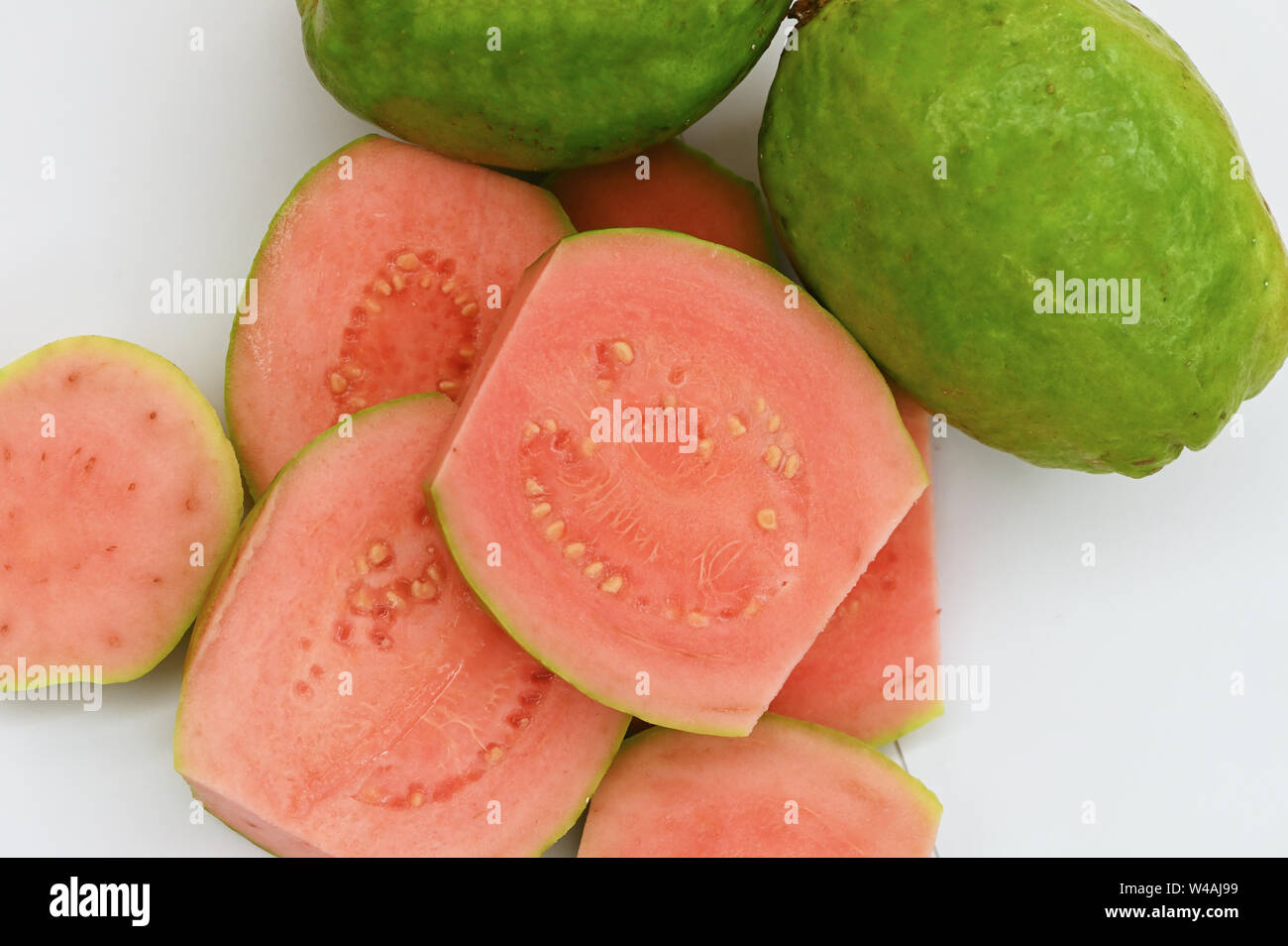 Close up of guavas whole and sliced Stock Photo