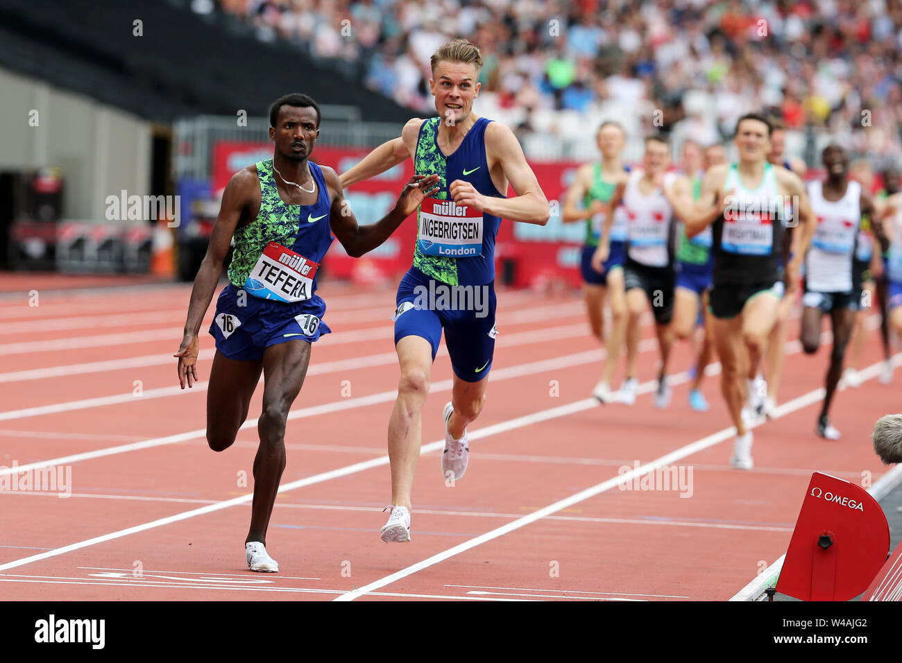 London, UK. 21st July 19. Samuel TEFERA (Ethiopia), and Filip INGEBRIGTSEN (Norway), crossing the finish line in the Emsley Carr Mile Final at the 2019, IAAF Diamond League, Anniversary Games, Queen Elizabeth Olympic Park, Stratford, London, UK. Credit: Simon Balson/Alamy Live News Stock Photo