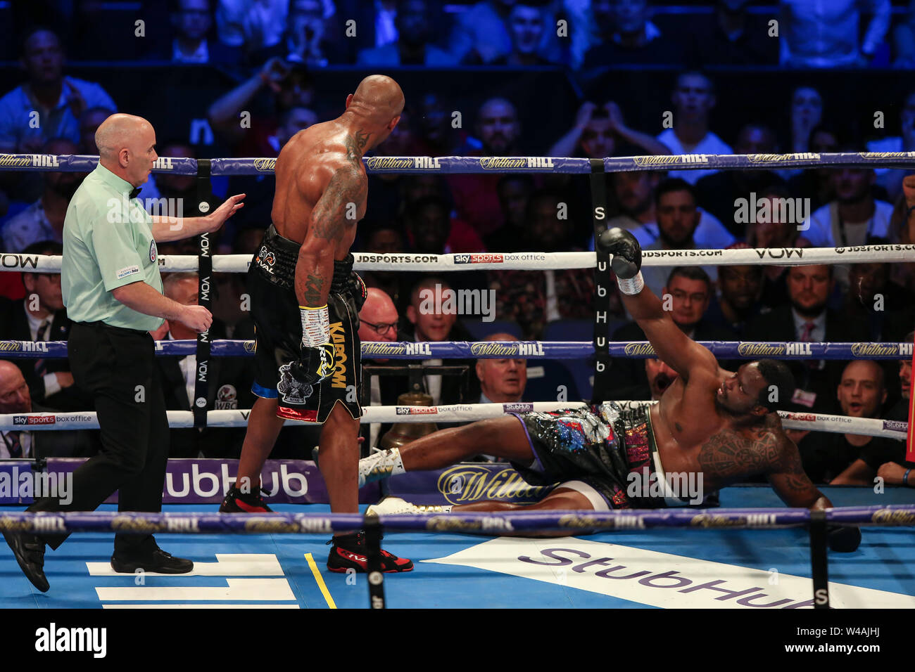LONDON, ENGLAND - JULY 20: Dillian Whyte is knocked down by Oscar Rivas during the vacant WBC Interim Heavyweight contest during the Matchroom Boxing Stock Photo