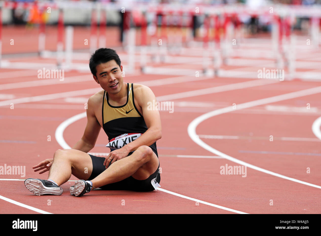 London, UK. 21st July 19. Wenjun XIE (China) celebrating victory in the Men's 110m Hurdles Final at the 2019, IAAF Diamond League, Anniversary Games, Queen Elizabeth Olympic Park, Stratford, London, UK. Credit: Simon Balson/Alamy Live News Stock Photo