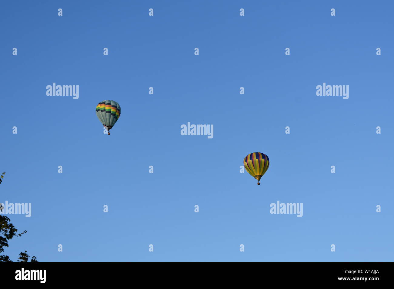 Hot air balloons blue sky Stock Photo - Alamy