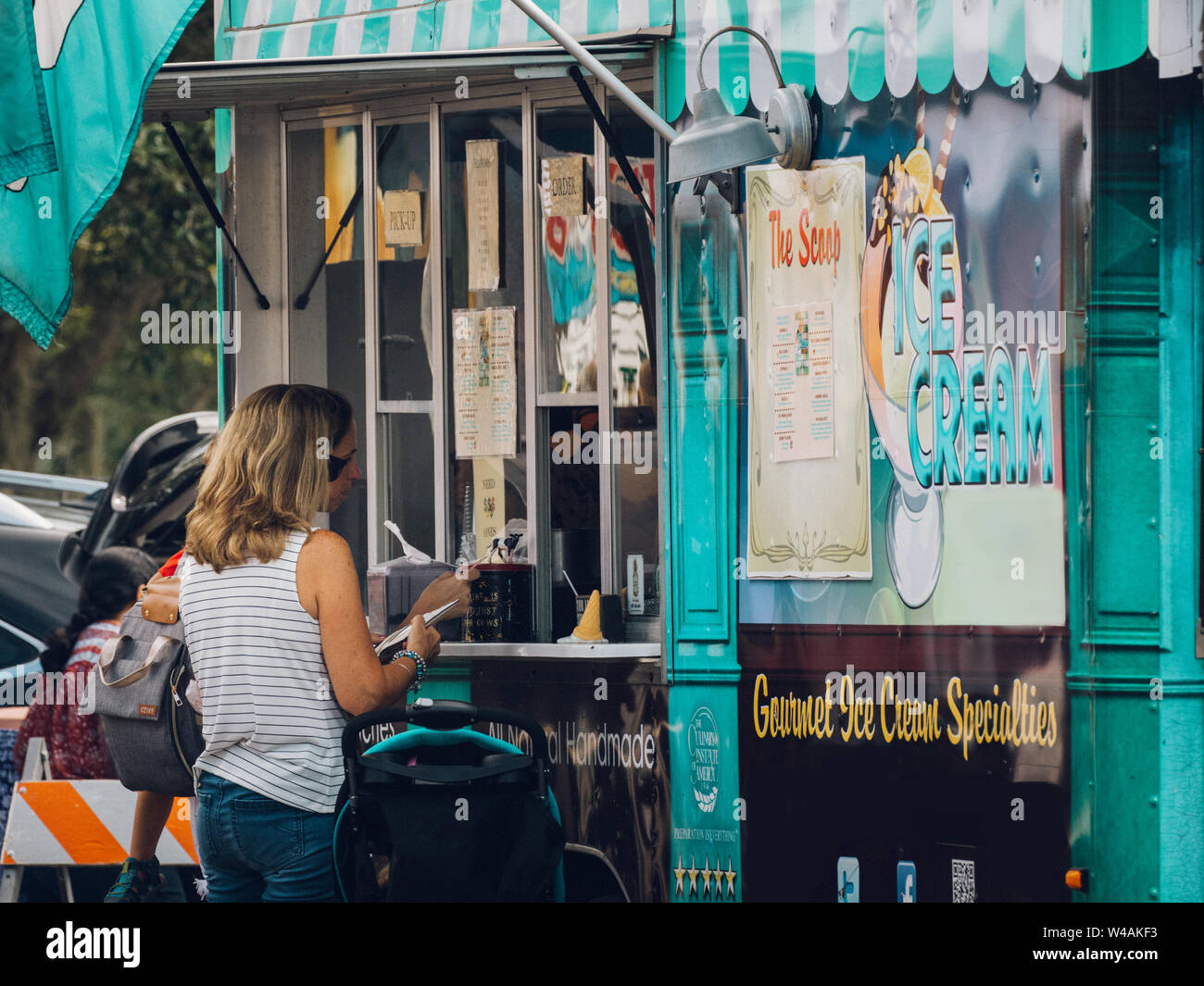 Food trucks gather for a festival in Sanford, Florida. Serving a