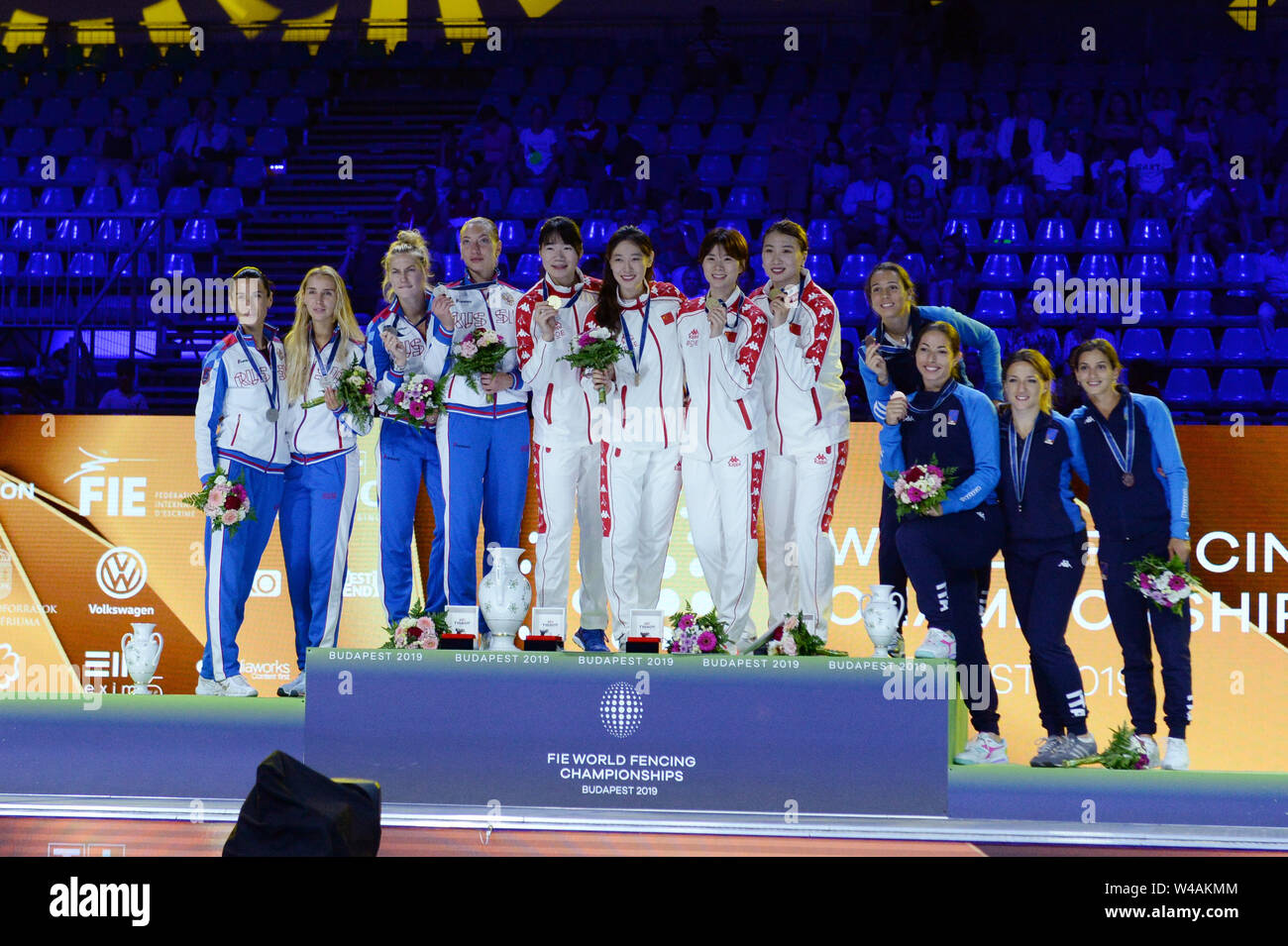 Budapest, Hungary. 21st July, 2019. Champion team China, center, second  place team Russia, left, and third