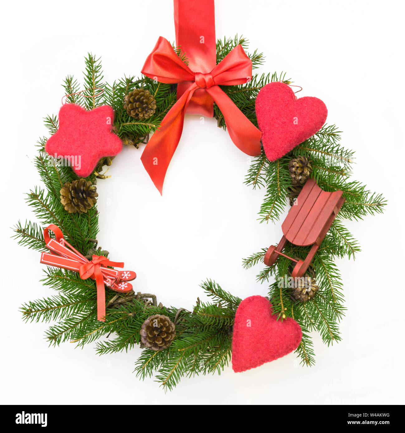 Christmas fresh natural wreath from spruce branch with red bow on white ...