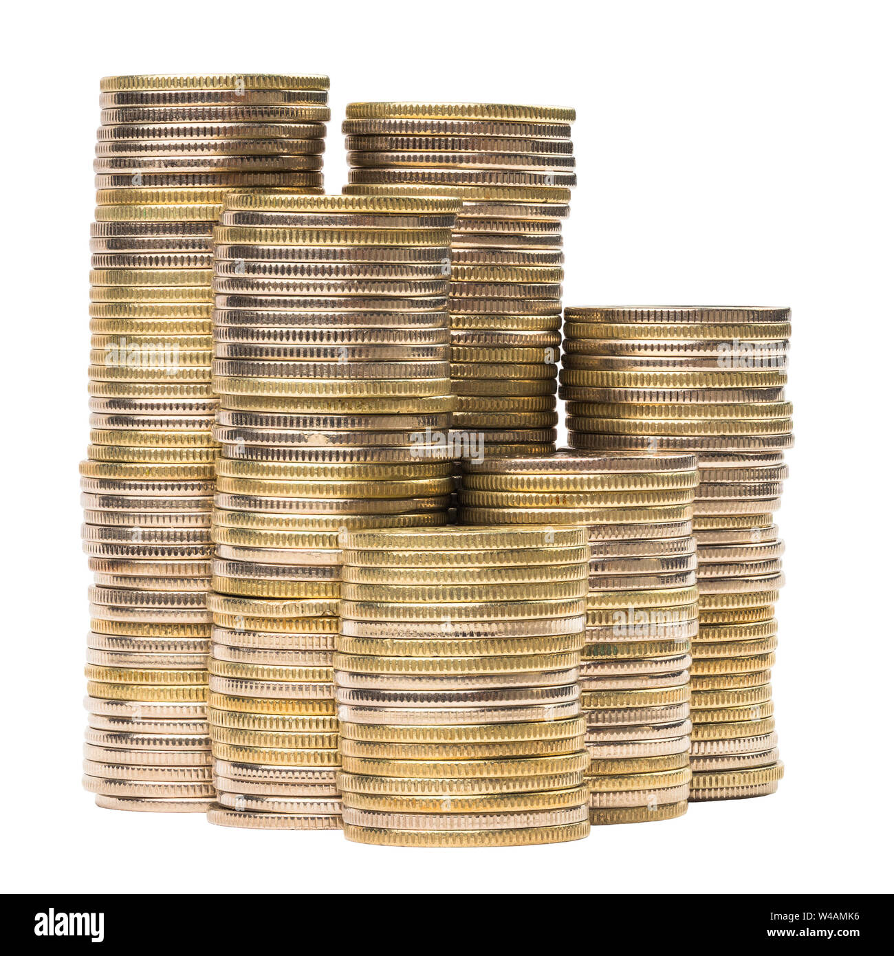 Small group of close standing coin stacks isolated on white background ...
