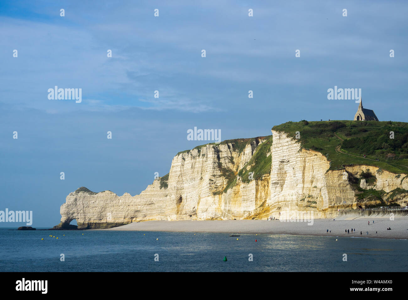 Scenic landscape of Etretat cliffs, iconic landmark of Normandy Coast, Falaise d'Amont, on late afternoon, France Stock Photo