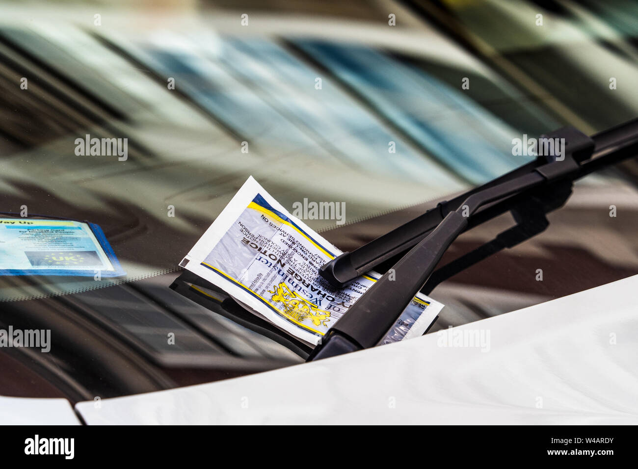 Parking Ticket London - Parking penalty ticket on a car windscreen. City of Westminster Penalty Charge ticket on a car in central London Stock Photo