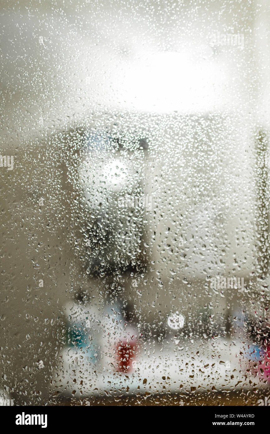 Rain droplets in shower door Stock Photo