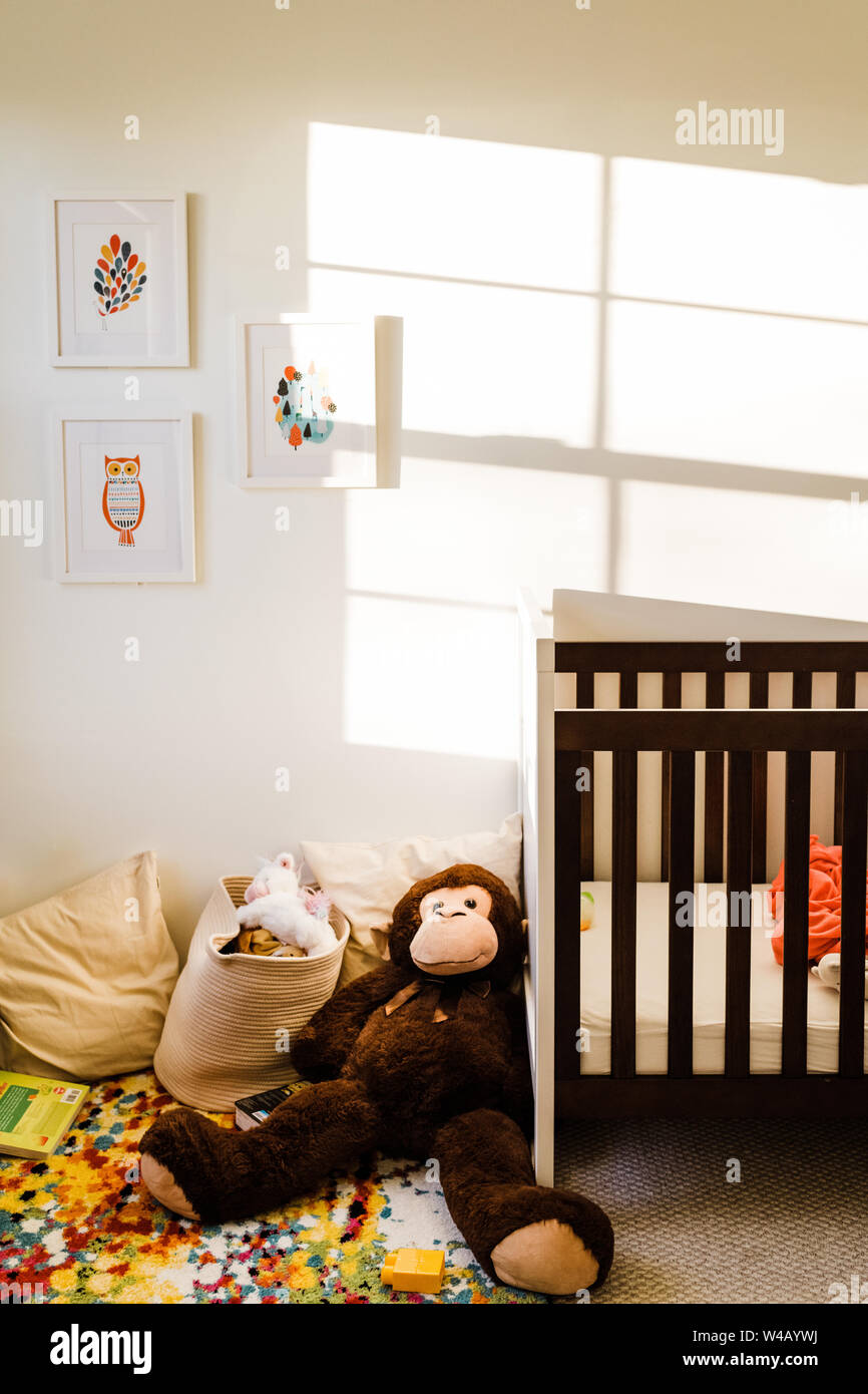 Child's crib and toys Stock Photo Alamy