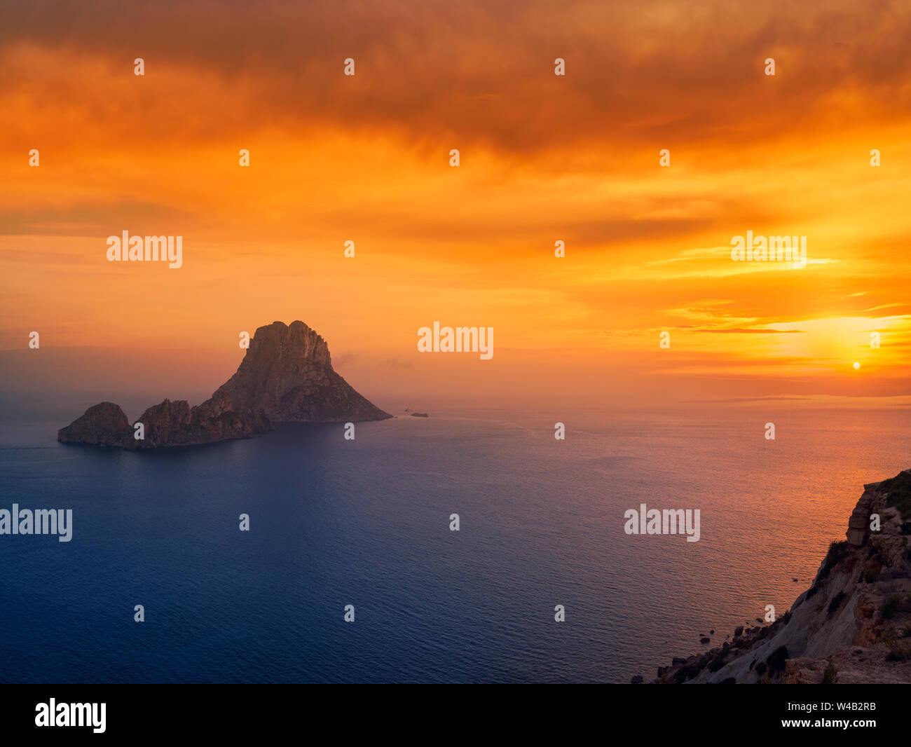 Es Vedra islet sunset in Sant Josep of Balearic Islands Stock Photo