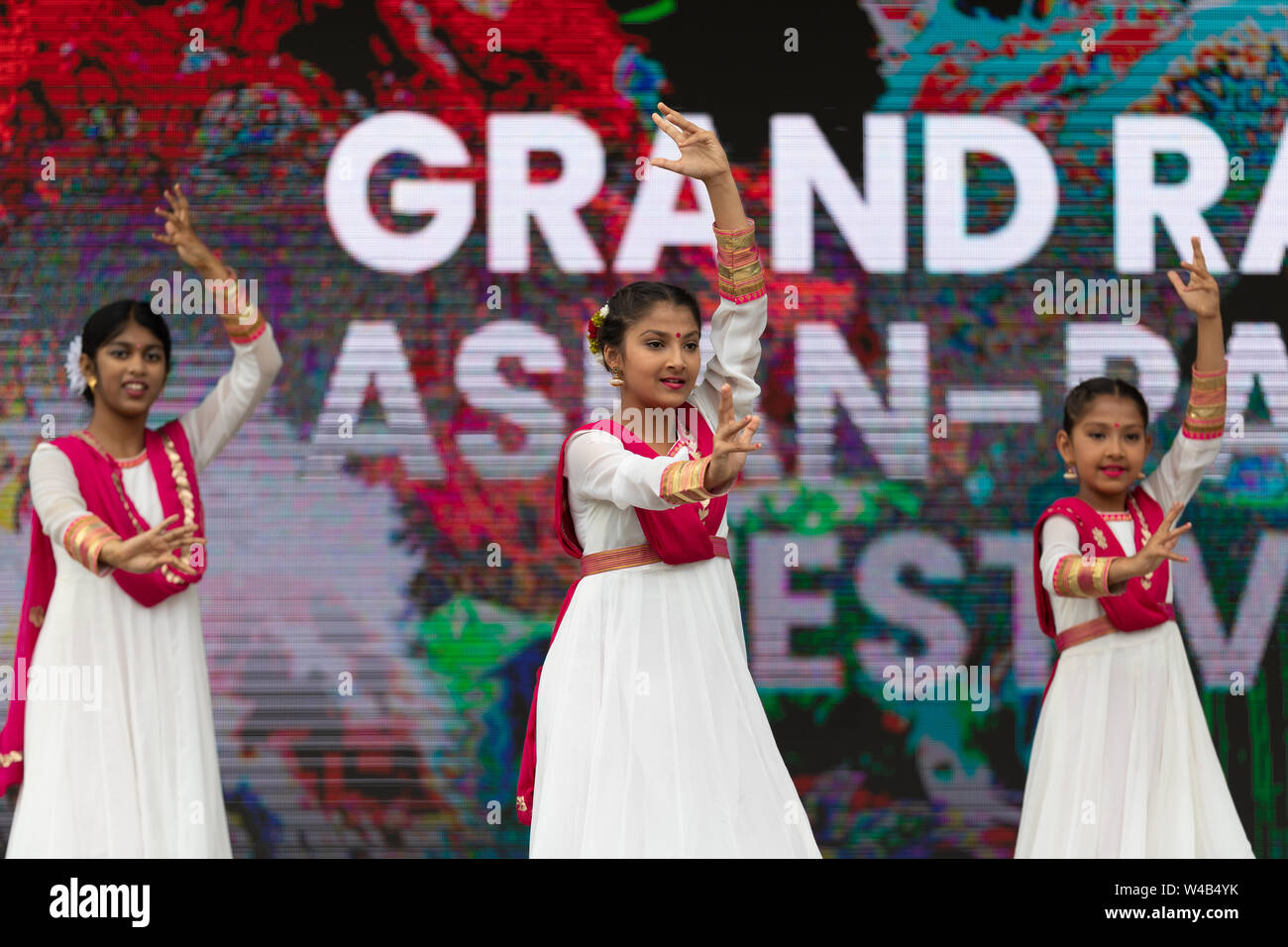 Grand Rapids, Michigan, USA - June 15, 2019: Asian Pacific Festival, Indian dancers wearing traditional clothing, performing a display of traditional Stock Photo