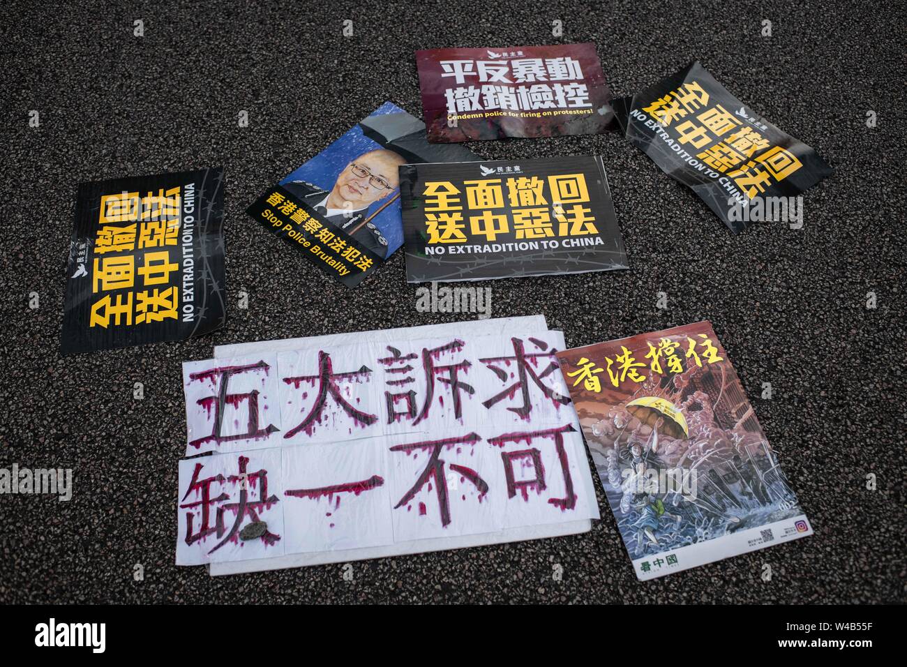 Poster with messages against the extradition bill and pro-democracy on the floor in front of Legislative Council.  Hong Kong demonstrators gathered for another weekend of protests against the controversial extradition bill and with a growing list of grievances, maintaining pressure on Chief Executive Carrie Lam. Stock Photo