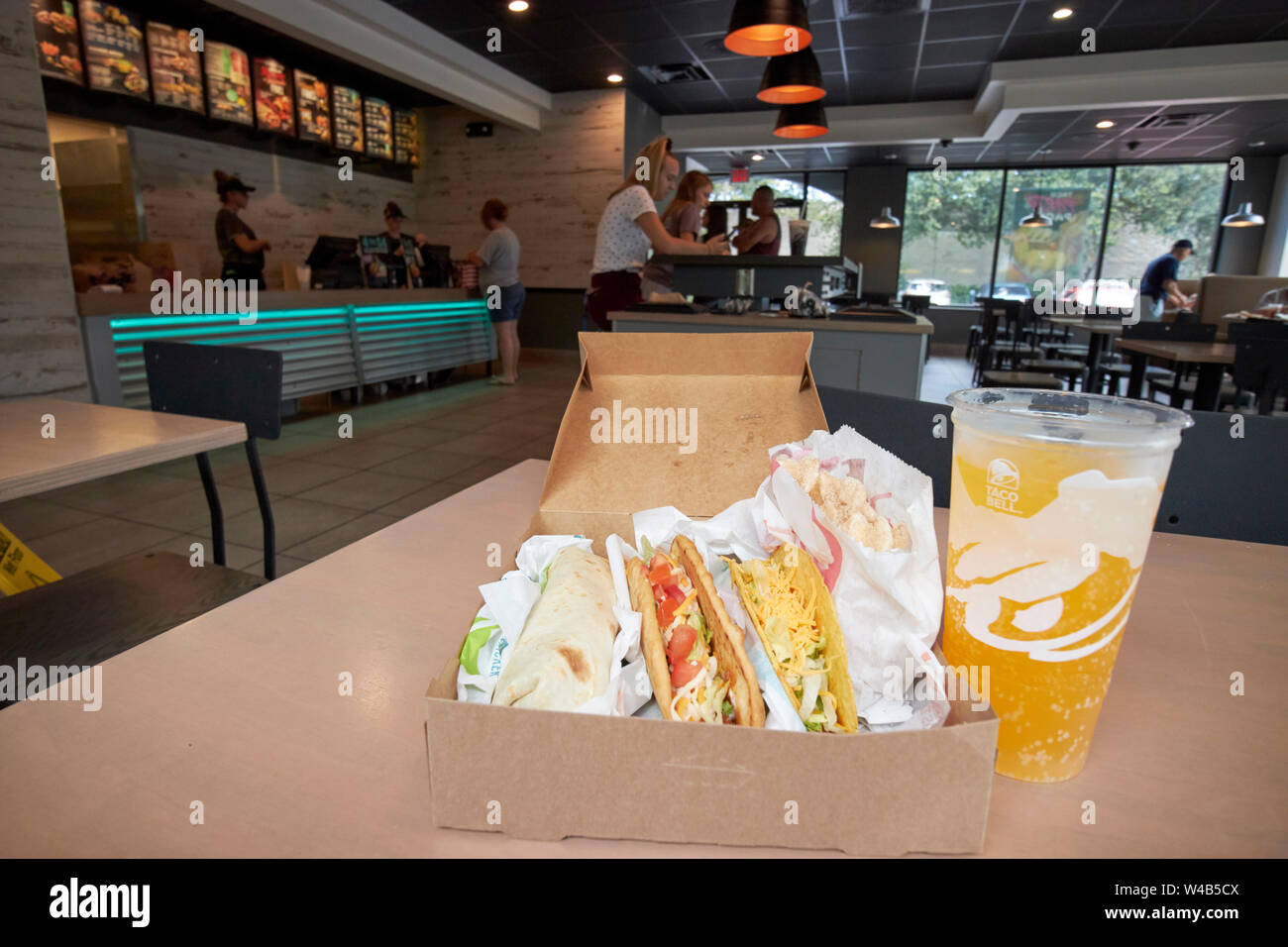 Taco Bell chalupa cravings box with burrito chalupa soft taco hard taco and drink in a taco bell restaurant Florida US USA Stock Photo