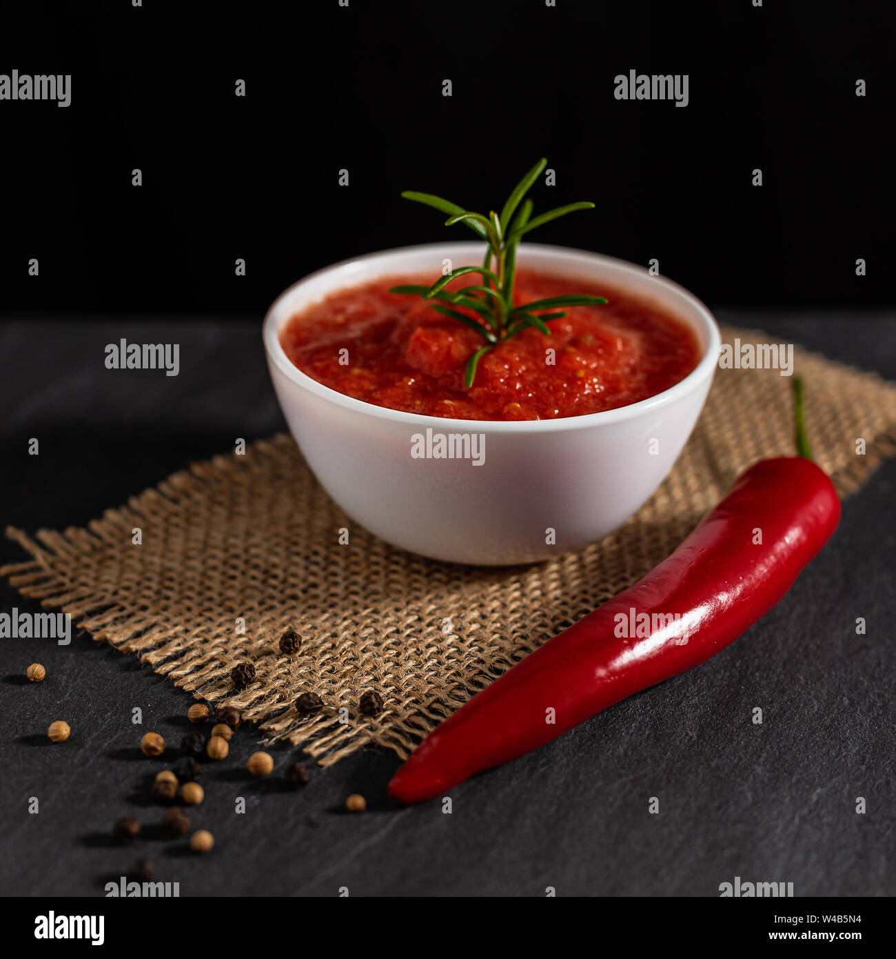 Traditional Maghrebi hot chili pepper sauce paste harissa. Tunisia and Arabic cuisine adjika