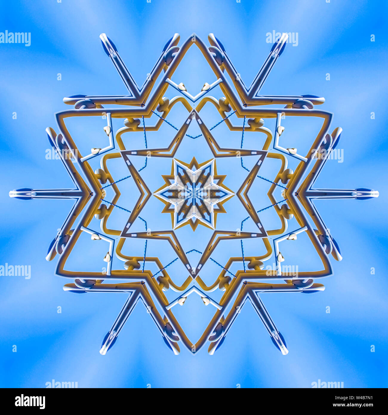 Metal beams making a star pattern in the sky. Geometric kaleidoscope ...