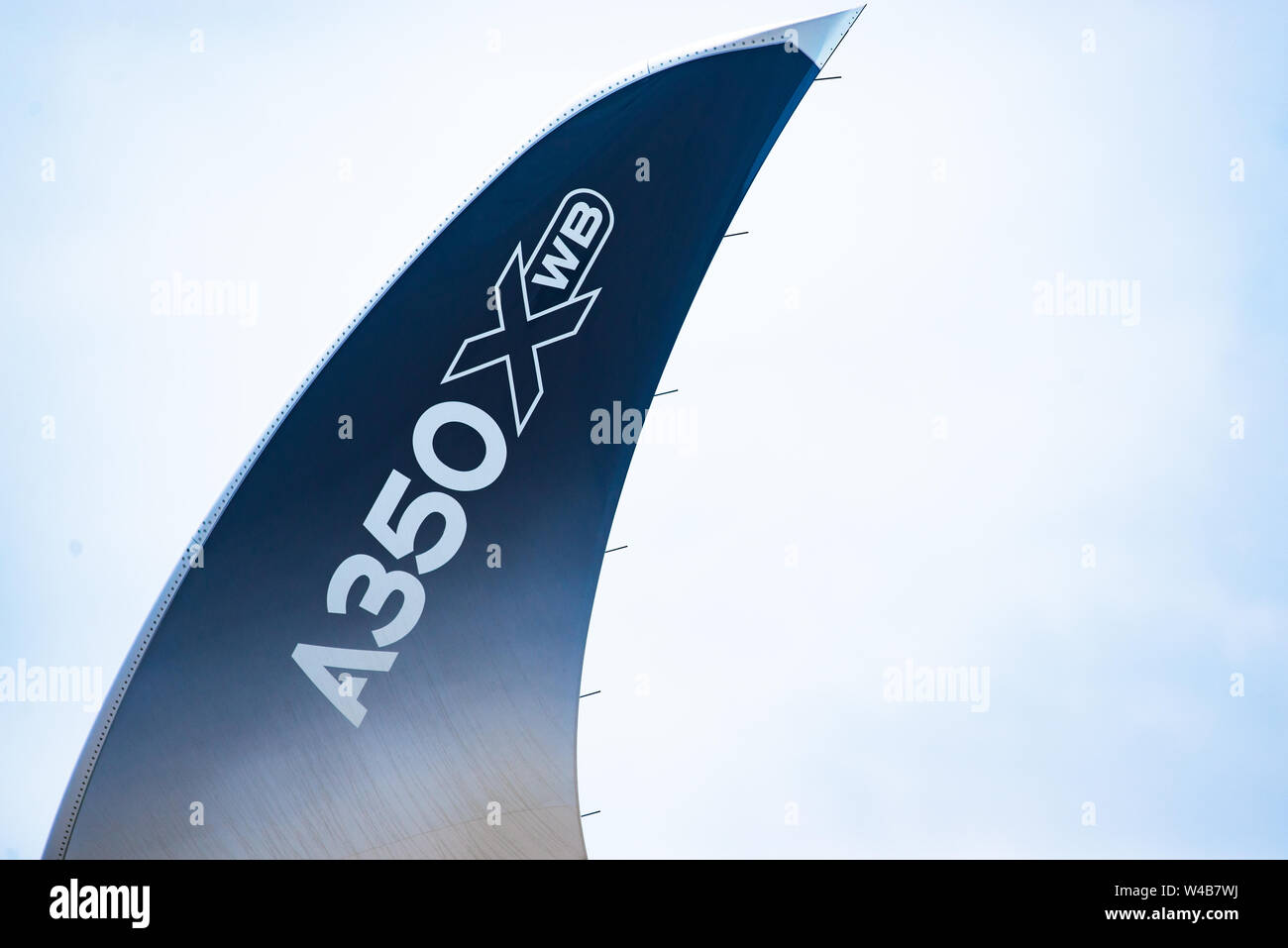 Singapore - February 4, 2018: Wingtip device, or winglet, of an Airbus A350-1000 XWB in Airbus factory livery during Singapore Airshow at Changi Exhib Stock Photo