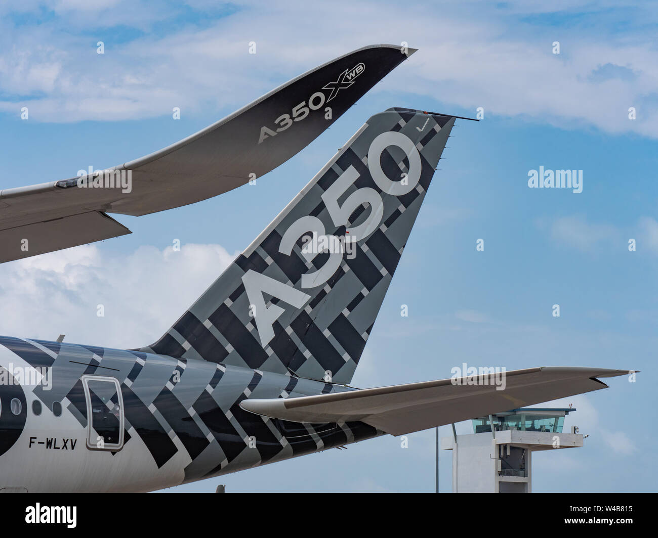 Singapore - February 4, 2018: Winglet and tailplane of Airbus A350-1000 XWB in Airbus factory livery during Singapore Airshow at Changi Exhibition Cen Stock Photo