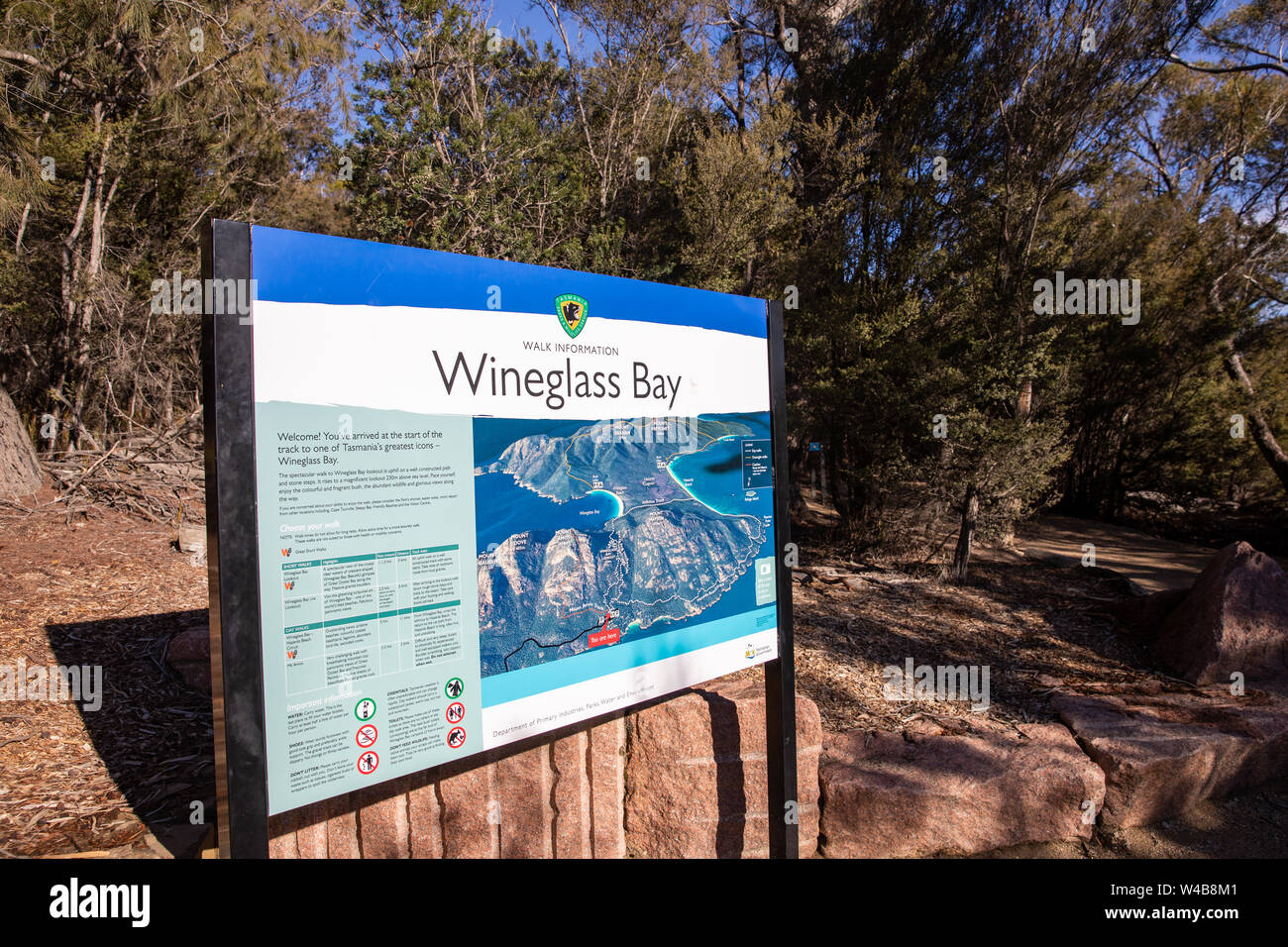 Wineglass bay information board and map at the start of the trail to